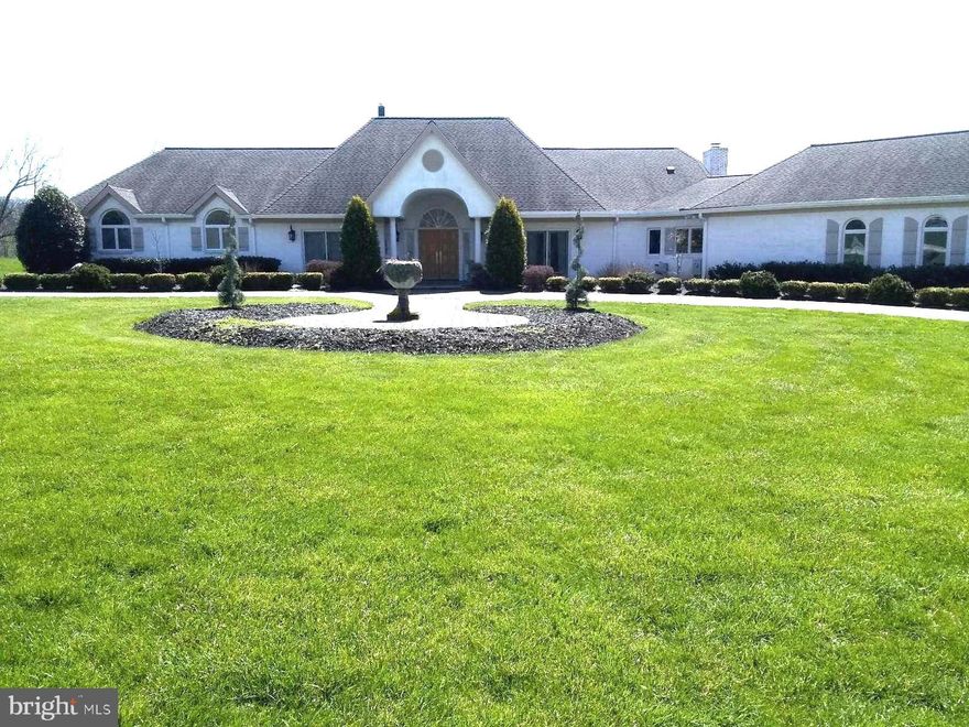 PROFESSIONAL PHOTOS COMING SOON. This fabulous sprawling one story home home with salt water inground pool sits commanding on a 9 acre estate in the prestigious community of Lambourne Downs in Hunt Valley.  This 4 bedroom 5/1 bath gem has a gourmet kitchen with large island, breakfast bar and breakfast room overlooking the pool.  Just steps away you will find the second complete kitchen or butler's pantry for catering with the formal dining room just steps away.  The dining room and formal living room both boast French doors.  The primary bedroom offers custom built-ins, a tremendous walking in closet, a recently renovated attached bathroom with heated floors, soaking tub separate walk-in shower, two custom sinks with dressing areas.  Each additional bedroom has its own full bath.  A den with custom built-in book cases flows into one of the bedrooms creating another private suite which could be an in-law suite.
The pool and patio area are fully updated and the pool has a stone bottom which never needs painting.  Grounds are professionally landscaped with custom lighting and surround sound.  Approximately one acre is equipped with an invisible fence for your fur baby.  Enjoy the serenity of the rolling hills and total privacy just minutes from the light rail, Hunt Valley Mall and Hayfields.
