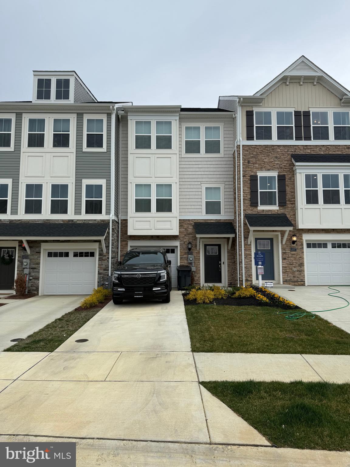 Stunning New build Townhome for rent! This home was built in July 2024! One car garage with parking pads for 2 large SUV's. Enter on the ground level that has a rec room with closet storage space, half bath and back yard exit. Main level has LVP throughout. Separate Dining area and Family Room. Stainless Steel Appliances in the kitchen and Island Seating Area. Recessed Lighting throughout the entire home. Large 2nd level deck perfect for entertaining! Spacious owners suite bedroom with walk in closet. Bathroom has dual vanities, granite countertops, and shower with bench. 2 additional good sized bedrooms and bathroom with upgraded ceramic tile. Available for potential May 1st move in! Pets on a case by case basis.