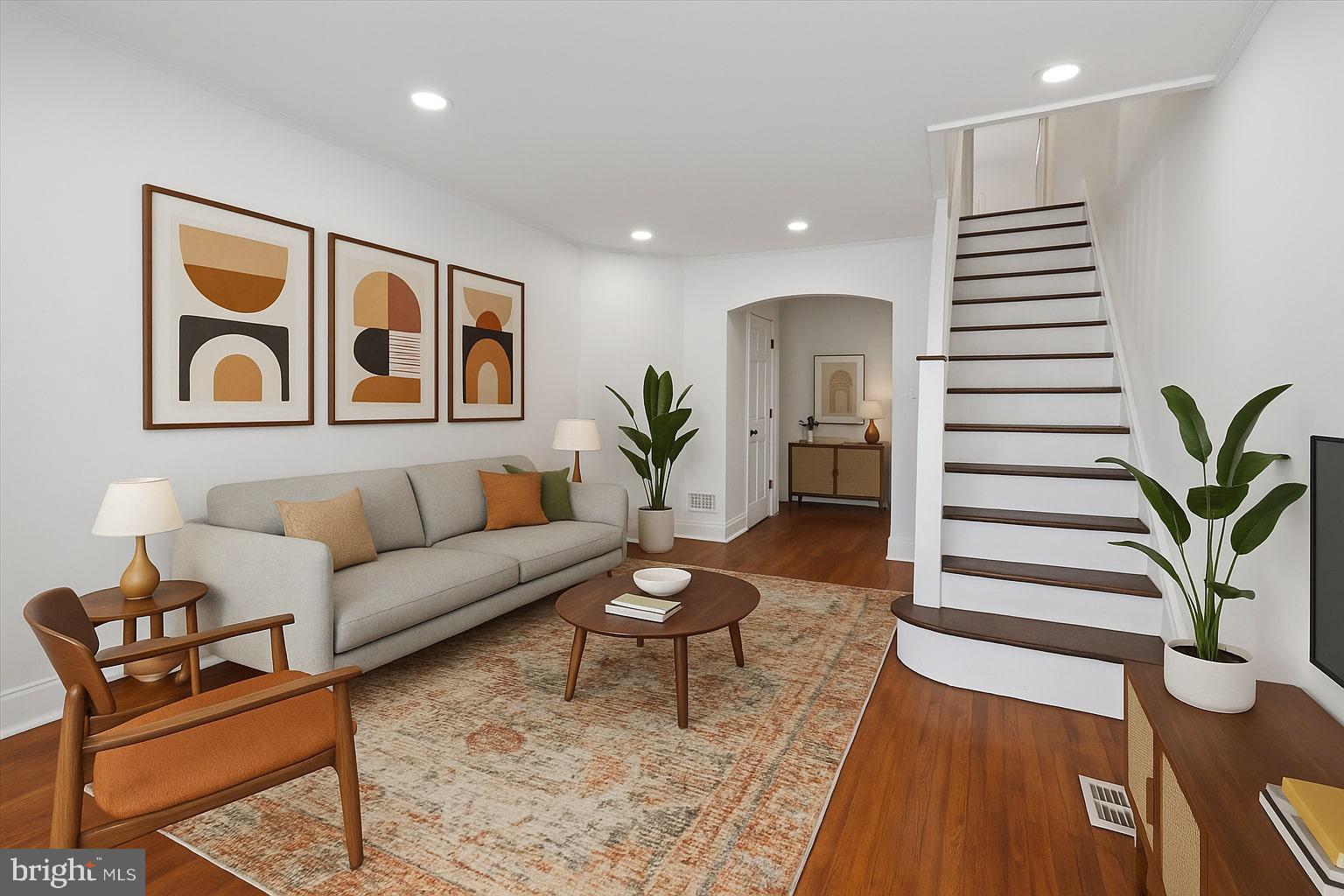 Welcome to 244 Rubicam Street! Fully renovated in 2023, this beautifully updated home blends timeless character with stylish upgrades. Step onto the charming front porch, a perfect spot for morning coffee or unwinding after a long day. Inside, you're greeted by original hardwood floors, all new windows that fill the space with natural light, and thoughtfully chosen designer lighting throughout. The main level includes a stunning chef’s kitchen with gray shaker cabinetry, quartz countertops, stainless steel appliances, and a convenient waterfall island, perfect for entertaining. The newly added first-floor powder room features modern finishes. Upstairs, you'll find spacious bedrooms with ample closet space, original hardwoods, and updated lighting. The full spa-like bath boasts a skylight, tub/shower combo, glass sliding doors, and contemporary fixtures. The fully finished basement offers extra storage space or space for a home office, gym, or secondary living space. Other highlights include central air, stylish millwork, and a private backyard retreat ideal for grilling or gardening. Easy access to Roosevelt Blvd, shopping, and public transit makes this home as convenient as it is beautiful. Schedule your showing today!