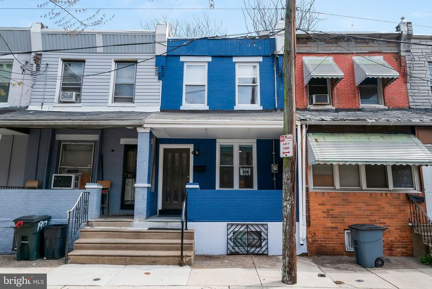 Welcome to your charming new home at 1919 South Hemberger Street in the vibrant West Passyunk neighborhood. Tucked away on a quiet side street, this move-in-ready gem has been lovingly maintained and thoughtfully updated. With 1,020 square feet of comfortable living space, it features three cozy bedrooms and two full bathrooms. As you enter, you'll be greeted by an open and inviting living area, filled with natural light that highlights the beautiful upgrades throughout. The kitchen is simply adorable, showcasing high-end materials that add a touch of luxury while maintaining a unique, charming, and homey feeling. Sleek stainless steel appliances perfectly complement the space, making cooking a joy. The bathrooms share this same attention to detail, with high-end additions that enhance their functionality and aesthetic appeal, all while preserving a warm and welcoming atmosphere. The lower level of the home is a standout feature, offering a large bedroom, a full bathroom, and a well-appointed laundry room, providing versatility and convenience. This home boasts two wonderful outdoor spaces. Enjoy a relaxing morning coffee on the covered front porch, or entertain guests on the back yard patio, ideal for summer barbecues or peaceful evenings under the stars. Located in a vibrant and fun neighborhood, this home is in the perfect location, close to everything the city has to offer. From dining and shopping to cultural events and entertainment. This property seamlessly blends modern conveniences with personal touches, offering a delightful urban living experience you won't want to miss!