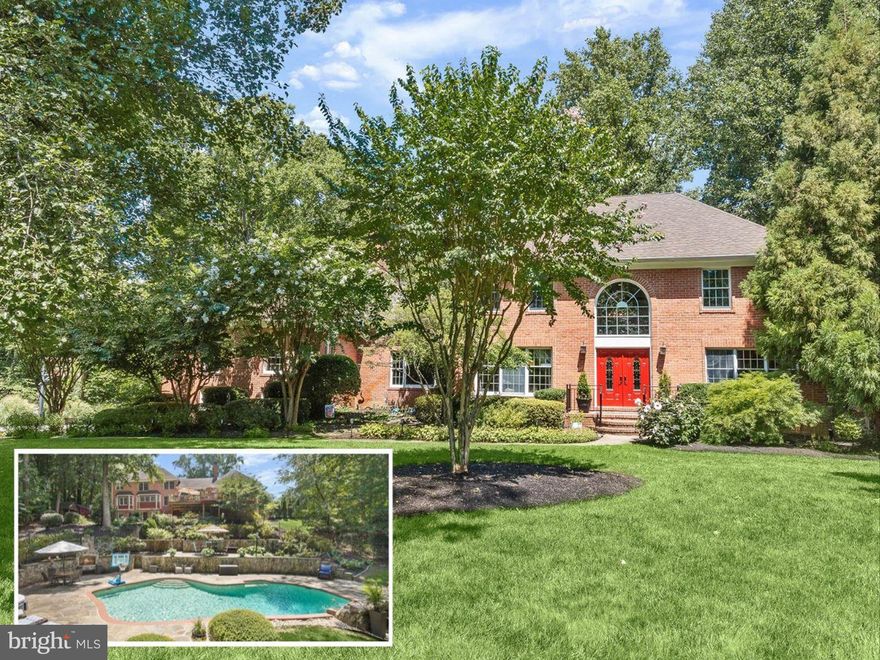 Welcome to this magnificent brick colonial home in the prestigious, water-privileged community of Harbour Glen along the Severn River. Located in the highly coveted Severna Park school district, this exquisite residence offers nearly 7,000 square feet of luxurious living space across three finished levels, set on a beautifully wooded 2.96-acre lot. The true outdoor oasis includes an expansive composite deck supported by nine new pillars, a flagstone patio ideal for a fire pit, a heated saltwater pool with a flagstone pool deck and waterfall, and an inviting outdoor fireplace. The property boasts professional perennial landscaping, enhancing its serene ambiance. Step into the grand two-story foyer, featuring new porcelain tile flooring and a motorized chandelier for easy cleaning and bulb replacement. To the left, you'll find a home office with French doors, while to the right, a formal living room with an elegant fireplace awaits. The living room flows seamlessly into the formal dining room, which features a bump-out of windows offering picturesque views of the backyard.
The gourmet kitchen is a chef's dream, equipped with Corian countertops, soft-close cabinetry, a tiered island, high-end stainless steel appliances including a Dacor cooktop, double wall ovens, and a Sub-Zero refrigerator. A wall of windows over the sink provides a stunning view of the backyard. The kitchen also features instant hot water and a Reverse Osmosis system. Adjacent to the kitchen is a breakfast area with a wet bar, complete with a Sub-Zero wine refrigerator and icemaker.
The great room is a highlight of the home, with its soaring cathedral ceiling, picture windows on both sides, and a floor-to-ceiling stacked stone accent fireplace. Just a few steps up from the great room leads to an expansive recreation room over the garage, featuring high ceilings, skylights, and custom shutters.
The upper level houses the primary bedroom, a true sanctuary with an en-suite bath that includes a walk-in closet, separate vanities with granite countertops, a luxurious soaking jetted tub, and a frameless glass steam shower. Three additional bedrooms and a full bath complete the upper level. 
The freshly painted lower level offers a family room with a third fireplace, patio access through a sliding glass door, a fifth bedroom, and an attached full bath, making it perfect for guests or extended family. Additional features of the home include a side-loading three-car garage, a new water softener system, a 2,000-gallon septic tank, a 45k kw diesel generator, a four-zone HVAC system, and surround sound in the recreation room, family room, and on the deck.
The property is equipped with front and back irrigation systems, including a drip system for the landscaping, and features recently added iron railings on the stairs to the pool. A storage shed and a charming playhouse add to the home's appeal. The community offers water access on the Severn River, perfect for nature watching and enjoying the Blue Angels.
This extraordinary home spares no expense. Every detail has been meticulously crafted to create a living experience that combines unmatched luxury and comfort both inside and out.