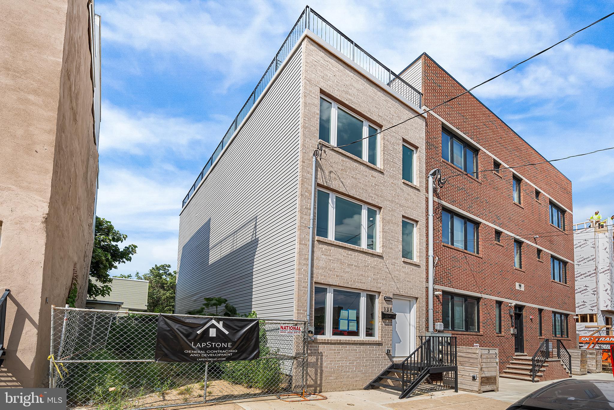 Introducing 127 E Cumberland, a striking brand-new construction residence offering 2,270 square feet of refined living space in the vibrant Fishtown area. This 4-bedroom, 2-bathroom home blends contemporary design with exceptional craftsmanship, delivering the perfect balance of style and functionality.
Upon entry, you are welcomed by an expansive open-concept layout highlighted by oversized windows that fill the interior with natural light. The gourmet kitchen serves as the focal point of the main level, featuring premium stainless steel appliances, quartz countertops, a designer tile backsplash, and custom cabinetry with elegant hardware.
The upper levels include generously sized bedrooms with ample closet space and a beautifully appointed full bathroom with timeless finishes.
The fully finished lower level provides versatile living space ideal for a home office, gym, or media lounge, with additional room for storage.
A true highlight is the private rooftop deck, offering panoramic views of the Philadelphia skyline—an ideal setting for entertaining or unwinding. This home is also accompanied by a 1-year builder warranty, offering peace of mind to the discerning buyer.
Positioned near Fishtown’s acclaimed restaurants, cafes, and boutique shopping, this home provides convenient access to all the neighborhood has to offer while maintaining a quiet residential feel.
Schedule your private showing today and experience the quality and design of this exceptional property.