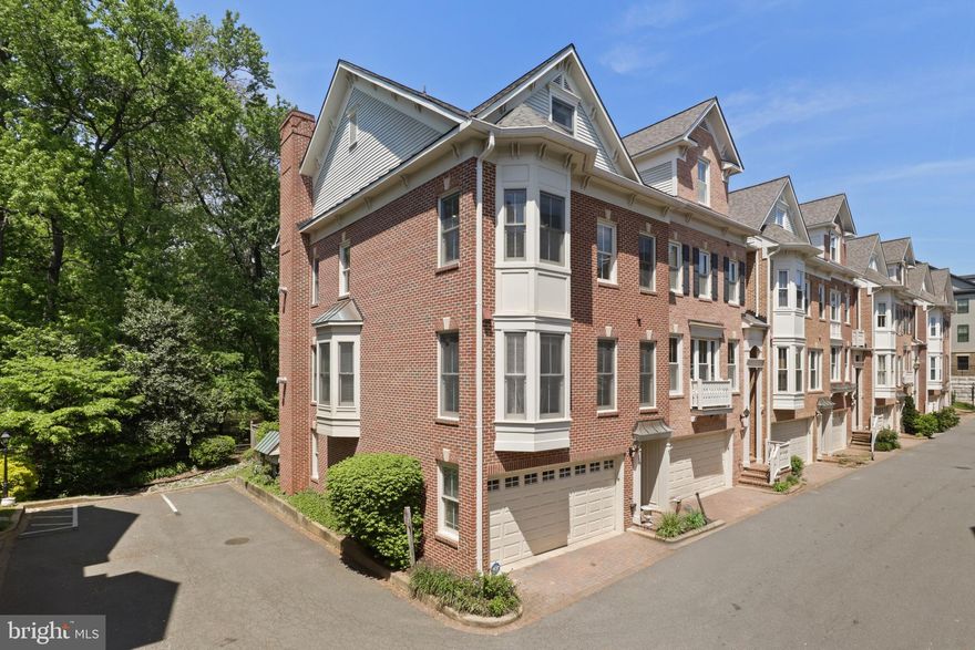 Welcome to this meticulously maintained, quality-crafted 4-level brick-front and side end-unit townhome—ideally situated in one of Arlington’s most sought-after neighborhoods, within the top-ranked Arlington Public School District.
Backing to lush Arlington County parkland, this light-filled home offers serene privacy and stunning natural views. Thoughtfully designed, the layout features a formal living room and a separate dining room—perfect for hosting. The large eat-in kitchen opens to a cozy family room and includes a walk-in pantry for added convenience.
The spacious primary suite offers dual walk-in closets and a luxurious en-suite bath with a soaking tub and separate shower. Gleaming hardwood floors span the upper three levels, creating a warm, elegant ambiance throughout.

You’ll also appreciate the practical upgrades that bring peace of mind:
   * New roof (2019)
   * One HVAC replaced (2021)
   * New water heater and garage door

Additional features you'll love:
   * Two fireplaces for added charm
   * Private flagstone patio—ideal for outdoor dining or relaxing
   * Two-car garage with abundant storage space
   * Easy access to I-66, I-495, and Route 7
   * Walkable to East Falls Church Metro
   * Just minutes from Charles A. Stewart Park and Tuckahoe Park

This exceptional townhome offers a rare blend of peaceful, park-side living with unbeatable commuter access and award-winning schools. A true gem in North Arlington!