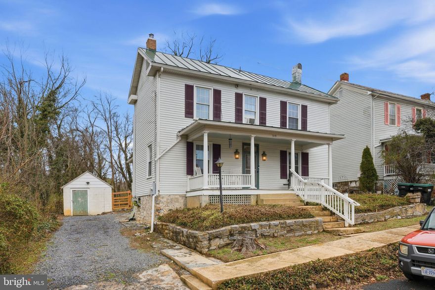 This charming historic Victorian home, built in 1896, is a true gem nestled in the heart of Woodstock’s prestigious

Historic District in the scenic Shenandoah Valley. Located at 219 N Church Street, this classic two-story residence exudes timeless appeal with its pristine white siding, elegant purple shutters, welcoming front porch supported by stately columns, arched entry door, and distinctive green metal roof that beautifully complements its late-19th-century character. Offering 4 generous bedrooms and 3 full bathrooms, the home provides plenty of space for comfortable family living, guests, or a home oﬃce. Step inside to discover gracious rooms bathed in natural light from large windows, original architectural details, and the enduring craftsmanship that defines Woodstock’s rich heritage—home to the Shenandoah County Courthouse (the oldest west of the Blue Ridge) and a beautifully

preserved collection of Victorian, Colonial Revival, and other period architecture. Thoughtful modern updates ensure easy, worry-free enjoyment while honoring its historic integrity: • New roof and water heater installed in 2018 • LeafFilter gutter guards added in 2025 for seamless maintenance • Paddock-style fencing installed in 2025, beautifully framing the property. The expansive, park-like lot is surrounded by mature trees and lush greenery, creating a serene, private oasis ideal for gardening, outdoor relaxation, or simply soaking in the peaceful valley views. The well-maintained grounds feature ample space for entertaining or quiet enjoyment, all within easy walking distance of Woodstock’s charming downtown—filled with unique shops, local eateries, historic sites, and community events. Perfectly positioned in one of Virginia’s most enchanting historic

towns—founded in 1761 and steeped in Revolutionary and Civil War history—this 1896 treasure combines authentic period charm with modern conveniences in the heart of the Shenandoah Valley. Whether you’re seeking a piece of local heritage or a peaceful retreat with mountain proximity, this home is ready for its next chapter. Schedule your private showing today and experience the magic of historic Woodstock living!