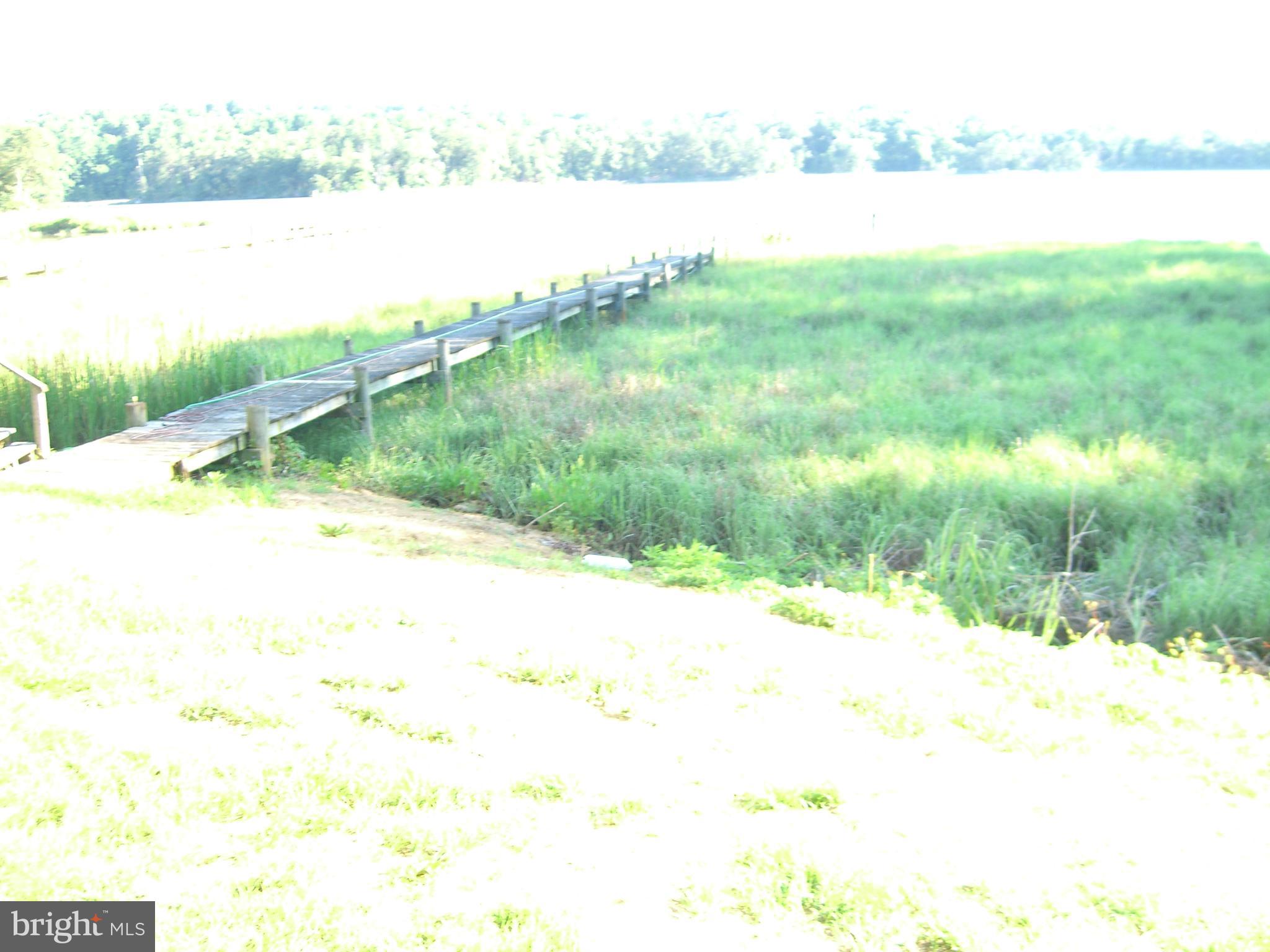 JUST REDUCED THIS IS A DEAL = THIS 3 BEDROM 1 1/2 BATH CAPE COD NEEDS A LITTLE WORK ITS WATERFRONT ON INDIAN CREEK WITH A PIER.