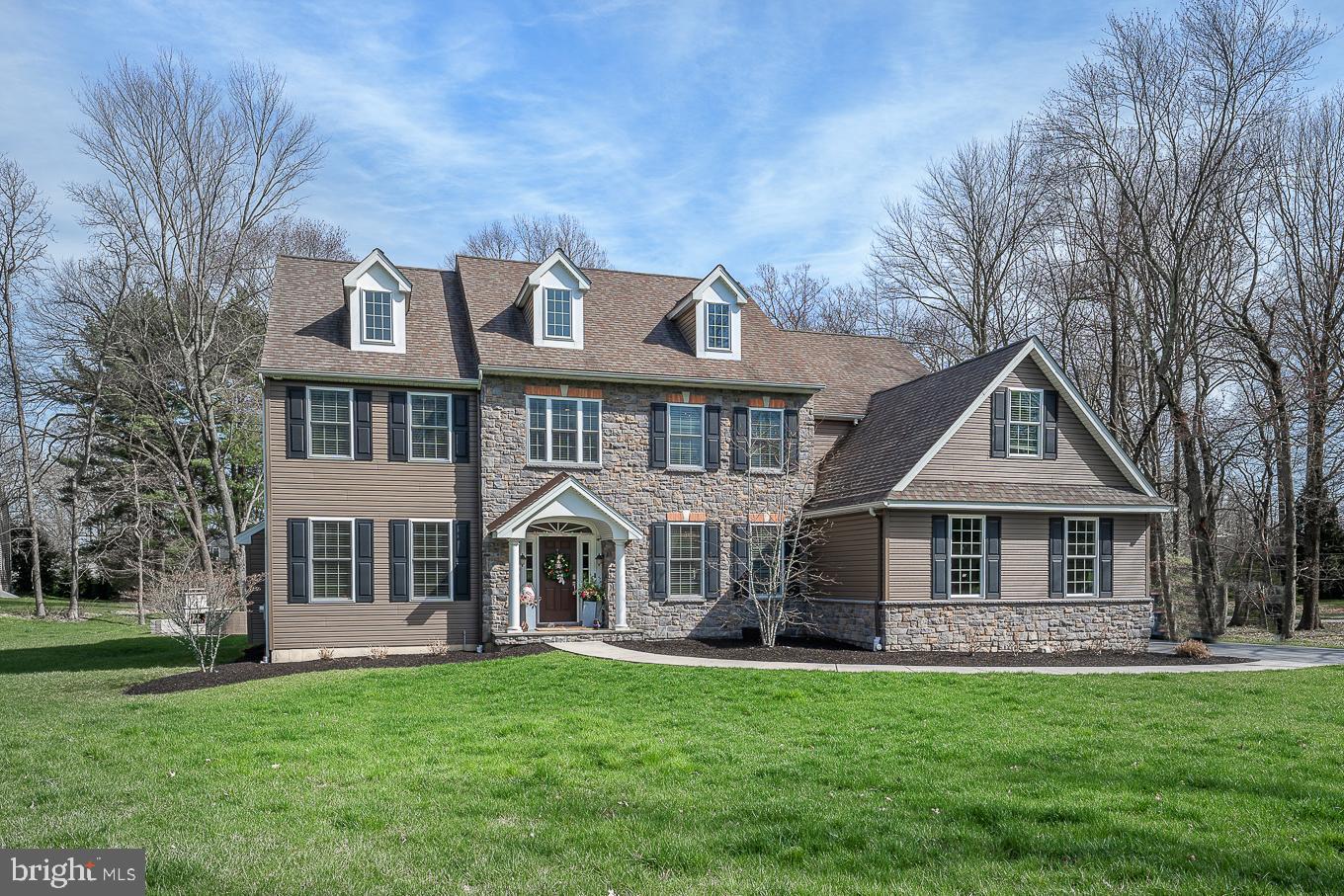 Welcome home to 1606 Atlee Drive, a gorgeous 5 bedroom, 3 full and 2 half bath home, sitting on almost an acre on a quiet cul-de-sac. Enjoy all the features you would expect to see in this 5 year young house, including beautiful hardwood floors throughout, extensive millwork and custom cabinetry and lighting. Enter the beautiful, classic foyer with a grand staircase, detailed moldings and custom Millwork. The formal living room and dining room are on either side as you step inside. The living room is light filled and has a gas fireplace. The formal dining room is the perfect size for hosting and entertaining with a new built in butler's pantry with a wine refrigerator and built in cabinets. There is a formal powder room and an office with double glass privacy doors - perfect for today's "work at home" environment. This leads to the open family room , breakfast room and kitchen - this gorgeous kitchen will take your breath away. The gourmet kitchen has a large granite island with a farm sink, custom cabinetry with quartz countertops, Viking appliances and a tumbled stone backsplash. The breakfast room has a tray ceiling and has sliders to a deck and outside patio and fireplace. The family room has a cathedral ceiling and a gas fireplace with a new brick surround. The mud room has a built in bench , shelves, coat closet, new shiplap tile and access to the back stairs and 3-car garage. Head up the stairs to the landing with a new built in bench and hardwood floors on the 2nd floor. The Primary Suite has a large sitting room with a wall of closets. The bedroom has a tray ceiling and 2 walk-in closets. The Primary bath has Carrara marble , featuring a large shower, soaking tub and 2 separate vanities with quartz countertops. There are 4 additional bedrooms, a hall bath a Jack and Jill bathroom and laundry room. The completely renovated basement has a gas fireplace, brick and shiplap walls, a powder room and barn doors to an office. There is plenty of additional space for storage and a workout room. This home is convenient to downtown Malvern and West Chester and all major roadways. A perfect home with all of the amenities for today's lifestyle.
