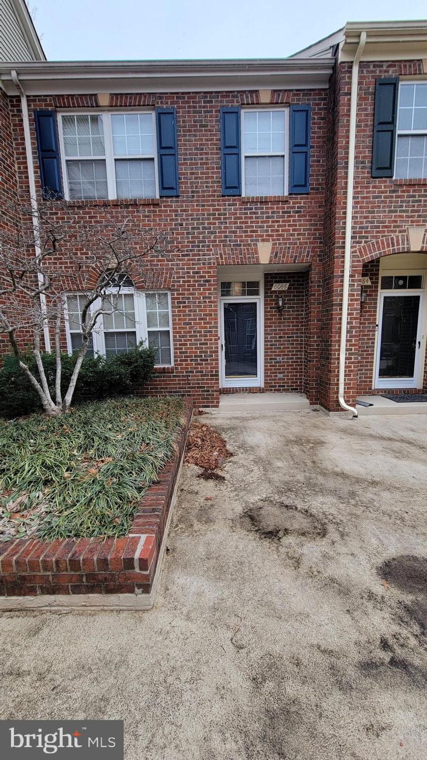 Three level brick townhouse with an underground two car garage. This home features a 2-sided fireplace, hardwood floors, 9' ceilings, vaulted bedrooms. Main level family room, lower-level rec room w/sliding glass door opens to the patio. Great location only 20 minutes to DC