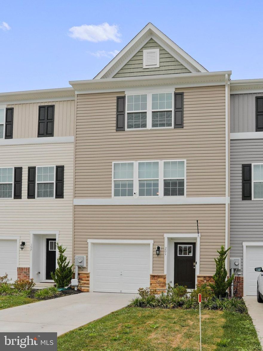 Welcome to Drexel! This recently built townhome has so much to offer! On the main entry level (lower level) is the garage offering off street parking and storage space, inside is a great room with a half bath and storage, as well as access to the backyard with a new privacy fence! Upstairs on the main level is the open concept kitchen with an eat-at island and table space and large living room offering amazing natural light. The kitchen has stainless steel appliance, quartz counter tops and lots of cabinet space. Also, enjoy you  lovely deck (est. 10x14)! Upstairs are 3 bedrooms, and two full bath! The primary bathroom offers a stall shower and quartz dual vanity! All the bedrooms feature brand new ceiling fans! *Builder Warranty, Custom cordless blinds, additional parking at the parking lot across the street, 2 x 6 Construction