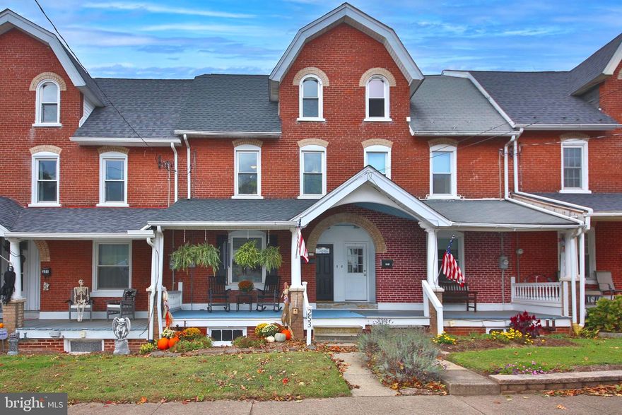 Step into timeless elegance with this stunning Victorian-inspired townhome in the heart of Souderton—a rare gem blending historic charm with modern comforts in a vibrant community. This beauty boasts a classic red brick facade, arched windows, and a welcoming covered front porch perfect for morning coffee or evening chats with neighbors. The expansive porch invites you inside through a grand arched entryway, opening to a light-filled open-concept living and dining area. Beautifully refinished hardwood floors flow throughout the space, complemented by vibrant, cheerful wall colors that create a welcoming atmosphere. The spacious living room offers plenty of seating with room for a sectional sofa and features stylish décor and ample natural light. The adjoining dining area is perfect for relaxing with family or hosting guests in style. The heart of this charming home—a beautifully updated galley-style kitchen that blends timeless warmth with modern convenience. Rich oak cabinetry pairs perfectly with sleek earthtone countertops, creating a cohesive and inviting space. The stainless-steel appliance includes a side-by-side refrigerator, built-in dishwasher and stove with overhead vent hood. Natural light pours in through the window above the deep stainless sink, framed with a built-in shelf, offers the perfect spot for greenery or decorative touches. The sellers added cabinets and counterspace that also allow for ample meal preparation. Don’t miss the newly added half bath tucked thoughtfully on the main level, it features a sleek vessel sink atop a rich espresso vanity with clean white countertop and crisp beadboard. The adjacent door with a stunning stained-glass accent leads to your sun-filled plant sanctuary, home office, or can be converted into a first-floor laundry room or breakfast nook overlooking the private rear yard. A low-maintenance composite deck with sleek white railings and black balusters, perfect hosting those summer BBQs. A cozy fire pit is ideal for evening gatherings under the stars. Two off-street parking spots and direct access to a lush community park, creating an expansive, park-like retreat right at your doorstep. The second-floor features three freshly painted bedrooms, each with plush neutral-toned carpeting and ceiling fans for year-round comfort. A well-appointed full hall bathroom with updated fixtures completes this inviting level. The finished third floor boasting a spacious fourth bedroom, large closet and versatile for a loft area, guest suite, or flex space. Completing the interior, the full unfinished basement offers a dedicated laundry area with washer and dryer, plus abundant storage.  Steps from local shops, parks, restaurants and top-rated schools, it's the perfect blend of small-town serenity and suburban ease. Schedule your showing today!