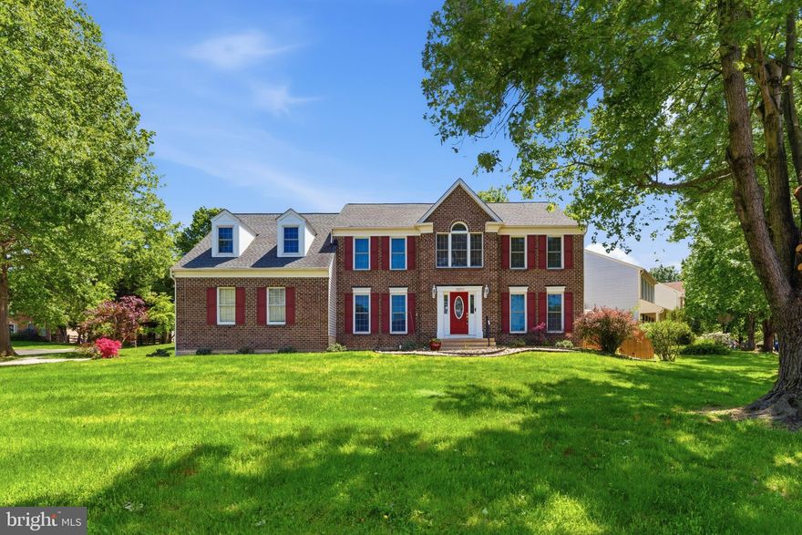 Welcome to this beautiful brick-front colonial perfectly positioned on a corner lot in a desirable, quiet setting close to shopping and near parks. From the moment you step inside, the grand two-story foyer sets the tone, opening to an oversized dining room that is perfect for hosting gatherings both large and small.

The updated gourmet kitchen features granite countertops and stainless steel appliances and flows effortlessly into the sunken family room, where vaulted ceilings, skylights, and a custom fireplace create a bright and inviting space to relax or entertain.

Upstairs, the spacious primary suite offers a true retreat, complete with a well-appointed luxury bath designed for comfort and relaxation.

The fully finished lower level takes this home to the next level, offering incredible flexibility and entertainment options. Enjoy a dedicated home theater room, a second full kitchen, wet bar, recreation area, private home gym, and additional bonus space that can easily adapt to your needs.

This home is loaded with thoughtful upgrades, including a roof and 13.5 kW solar panel system (2019), new windows (2020), roof insulation and gutter covers (2022), a new driveway and walkway (2023), and numerous recent updates through 2026, giving peace of mind for years to come.

All of this in a commuter-friendly location just minutes from I-270, with easy access to shopping, dining, and outdoor recreation at Seneca Creek State Park.
