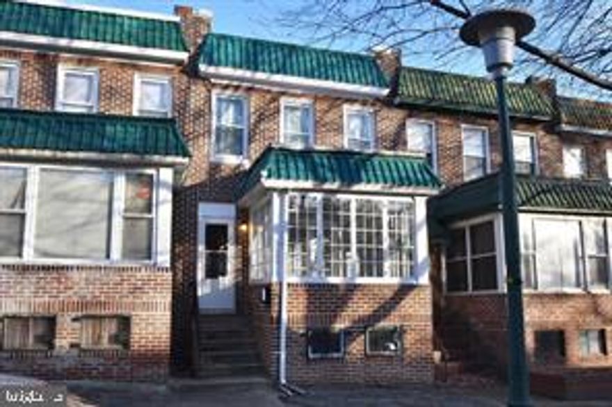 Come see this stylish 2 BR , 1 full bath row home ready for move-in!  New carpet and freshly painted throughout.  Large windows in living room make it bright and sunny for enjoyment.  Kitchen with granite counter tops and stainless steel appliances and upgraded bathroom.  Finished basement and fenced in backyard.