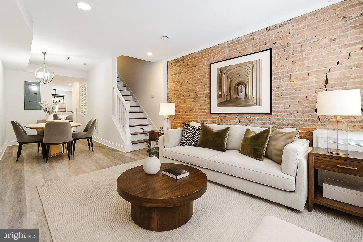 Welcome to 310 S Regester Street—a beautifully updated Fells Point townhome offering three bedrooms, three full bathrooms, and stylish living across three fully above-ground levels. Renovated top to bottom in 2017, this home blends historic charm with modern convenience, and all major systems are under 10 years old.
The heart of the home is the open-concept kitchen, featuring granite countertops, ample cabinet space, and easy flow into the main living area—perfect for everyday living or entertaining. The flexible 3-bed, 3-bath layout offers plenty of room for roommates, guests, or dedicated office space.
Upstairs, the top-floor primary suite is a true retreat, complete with a wet bar, walk-in closet, dual vanity bathroom, and a spacious flex area ideal for a home office or private lounge. Step outside to enjoy a two-level rooftop deck with panoramic 360-degree views of the city skyline, or relax on the private back patio below.
All of this is located just steps from the waterfront, Fells Point’s vibrant dining and nightlife, Johns Hopkins Hospital, and Downtown Baltimore. This is city living at its finest—don’t miss it!