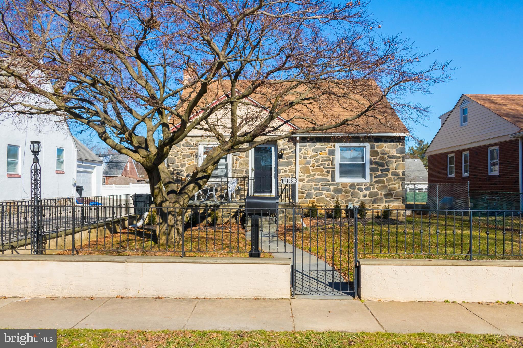 This recently updated detached single family 3 bed, 2 bed house is ready for you to call it home. The home features a fenced front yard and stone path to a sunny front patio perfect for sipping your morning coffee or relaxing after work. The garden has Boxwoods and Hostas for you to enjoy during the many warmer months. This home has oak floors throughout with a light-filled open concept living and dining area. There is a renovated kitchen featuring newer stainless-steel appliances including a dishwasher, microwave, gas range, and refrigerator with bottom freezer. Off the kitchen is a large mudroom with access to the rear parking area large enough for 3+ vehicles. The main floor also features the primary bedroom, which is large enough for a king-size bed, and a full bath featuring a large walk-in shower and medicine cabinet. The staircase to the second floor has a new oak banister. On the second floor are two more large light-filled bedrooms and a second full bath with a combination tub and shower as well as linen closet. In the basement, you will find two more finished rooms, perfect for a home office, media room, or playroom, with some built in closets and cable in wall. The basement also features a separate large storage space with built-in shelving and a washer and dryer. Other great features of this home include central air, enough off-street parking for 3+ vehicles, and raised garden beds in the side yard ready for your vegetable garden! This home is located in the Haverford School District and is convenient to many shopping centers, grocery stores, restaurants, parks, and walking trails. Available for rent immediately.