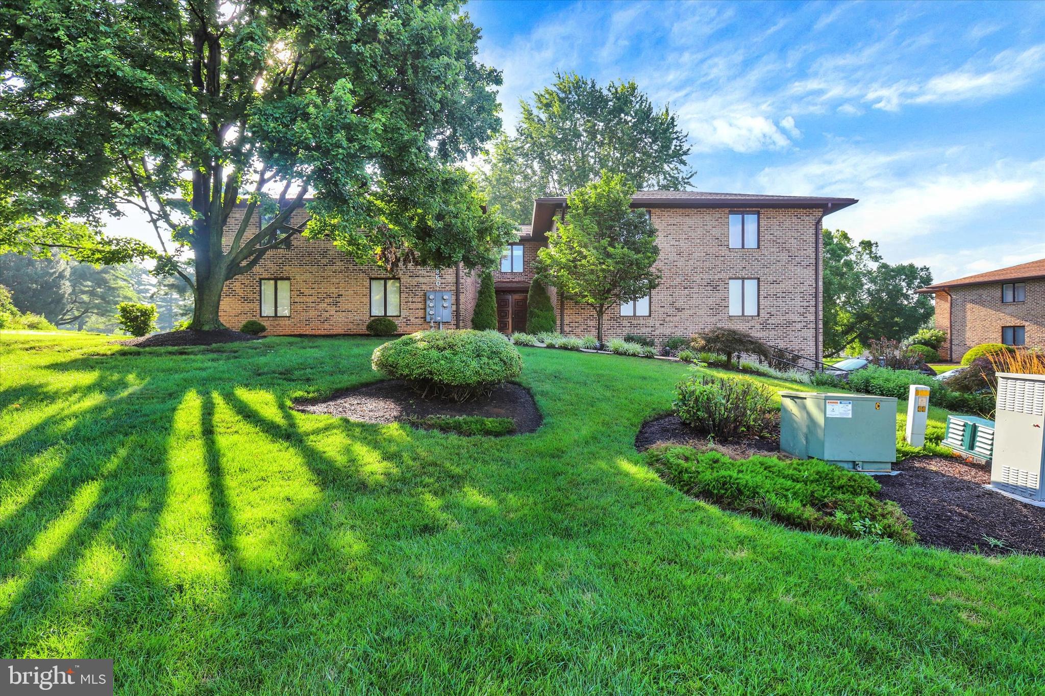 Convenient condo overlooking the 12th fairway of the Founder’s golf course in award winning Penn National Community! This home is on the 2nd floor, includes 2 bedrooms and 2 full baths. Each bedroom has a walk-in closet. Primary suite features a jet tub. Open floorplan living and dining area. A sunroom with sliding windows has the views! Unit has its own washer and dryer. Close proximity to the clubhouse and all its amenities. Condo fee covers exterior maintenance, lawn care, trash & snow removal, insurance, and common grounds. One parking space in garage, and additional driveway parking. Additional secured storage area in lower level. Back patio and common area are available for relaxing anytime! Lovely walkable community offers 36 holes of 4-star golf, outdoor pool, tennis/pickleball, yoga, community garden, hiking in Michaux State Forest, 40 + social clubs, restaurant/bar, and so much more! See pro shop for membership details.
