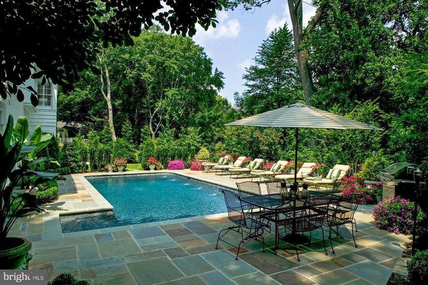 Unbelievable Value. Fabulous New Price.Thoughtfully renovated 6800 square ft. of living space. Six bedrooms, 6-full and 2-half baths,sited on nearly 1/2 acre lot. Chef's Kitchen. Elegant Living RM, separate dining RM. Comfortable family RM. Main level guest suite. Master Suite with his & her baths. Finished walk out lower level. Landscaped grounds. Heated Pool. Circular Driveway. 2 Car Garage.