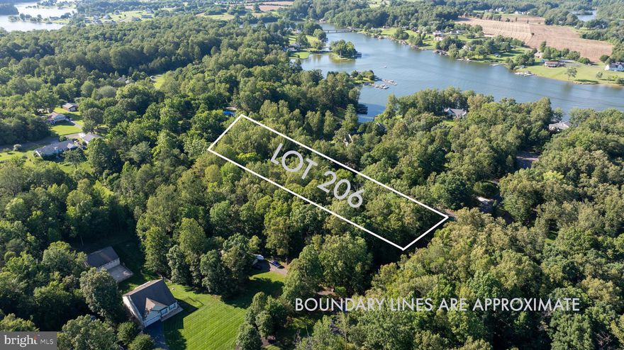 Wonderful 1-acre wooded water access lot on the public (cold) side of Lake Anna, located on a quiet cul-de-sac with no through traffic. Gently sloping—ideal for a walk-out basement—and backs to trees for added privacy. Assigned deep water boat slip included! Enjoy access to common area with boat ramp, sandy beach, picnic areas, fire pit, and stunning panoramic lake views. High-speed Xfinity internet available.  Adjacent lot also available—buy both for added privacy or as a family retreat!