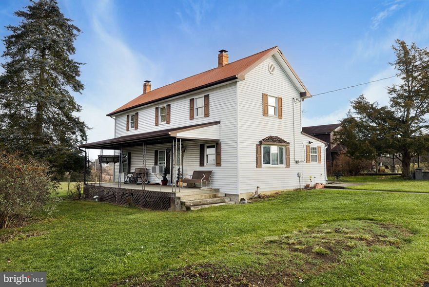 This beautiful, unrestricted property is situated in the serene landscape of South Berkeley County, WV, sprawling across a generous expanse of just under 7 acres. Offering a tranquil rural living experience, yet just minutes away from I81, shopping and restaurants. With its vast open spaces and lush greenery, this property would be ideal for a small farmette and provides an idyllic setting for both farming and recreational pursuits.
Charming older home with great potential for modernization, it also offers the opportunity for preservationists to maintain its authentic character. Perhaps the most stunning addition is an open-air pavilion, perfectly poised for hosting family gatherings, picnics, or even small community events.  In addition, are several outbuildings scattered throughout the property, perfect for extra storage space for tools and equipment. Whichever path you choose, each room offers a canvas for your vision, awaiting your personal touch to truly make it your own.