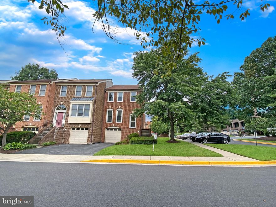 Beautifully updated End-unit Garage townhouse in sought-after Woodmont overlook. Hardwood floors throughout the entire 3 levels, ensuring a sleek and modern feel with the added benefit of being easy to maintain – no carpet here! This spacious and light-filled home is Freshly painted & professionally cleaned, Ready for immediate move in.  Great floorpan: Inviting High ceiling (over 10') entrance foyer w/large window and a coat closet, Expansive living and dining room, perfect for entertaining or family gatherings. Generous Sized Kitchen comes with a breakfast room, plenty of cabinets and counter space, brand new dishwasher and brand new refrigerator. Upstairs has 3 well-proportioned bedrooms, each with vaulted ceilings, alongside 2 updated full bathrooms. The finished lower level is a versatile space, offering a cozy family recreation room with a sliding door that opens to a brick patio and fenced backyard – your own private oasis for relaxation or gardening. Additional upgrades include a new energy-efficient HVAC (2023) with a 10-year warranty, a water heater replaced in 2022, a roof with new architectural shingles installed in 2019, and recently replaced double-pane windows and sliding doors, enhancing both the aesthetic and functional appeal of this home. Enjoy all the amenities and the conveniences that come with this location: Walking distance to metro, popular stores and restaurants on Rockville Pike, Congressional Plaza, etc. Short ride to Pike & Rose, Downtown Rockville, Easy access to I-270, plenty of parking spaces, Excellent schools. Available for immediate move in.