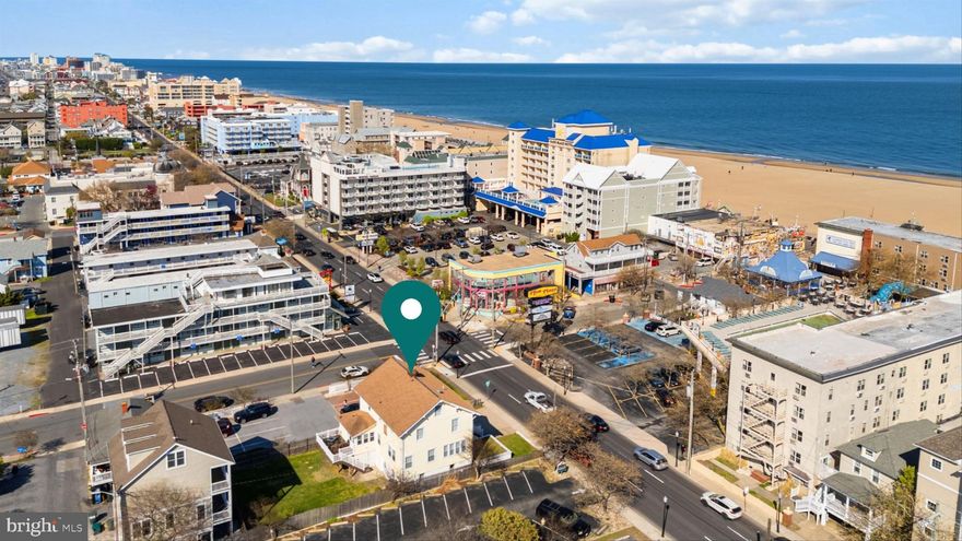 Seller financing available with favorable terms of 5%. .   Located  in the heart of downtown Ocean City, Maryland, this spacious 5-bedroom, 3.5-bath single-family home offers the perfect blend of beachside living, commercial potential, and investment opportunity. Just a short walk to the beach, famous Ocean City Boardwalk, Trimper Rides, Jolly Roger Amusement Park, Thrasher’s Fries, and countless other attractions, you’ll always be in the center of the action.

Zoned DMX, this property allows for both residential and commercial use—opening the door to endless possibilities such as a retail space, office, or mixed-use development. Inside, you’ll find generous living spaces perfect for family gatherings or hosting guests. The property also offers plenty of parking—a rare find in downtown—and an unfinished lower level that can be transformed into additional living space, a rental unit, or a recreational area, boosting both comfort and value.

Whether you’re searching for a lucrative investment, a business location, or your full-time coastal residence, this home delivers location, versatility, and potential.