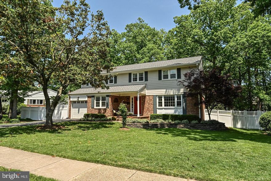 Stunning 3-level colonial in sought-after Cardinal Forest with no HOA! Beautifully landscaped with a touch of English Charm sitting on a 0.33-acre lot. Built in 1966 and offering 3,763 total sqft (2,563 above grade), this 4-bedroom, 2.5-bath home blends classic charm with extensive updates.
Main level features LVP and hardwood floors, formal living and dining rooms with decorative crown molding, and an updated kitchen with granite counters, custom tile backsplash, high-end cabinetry with glass doors, recessed lighting, Samsung double oven (2022), GE dishwasher (2022), and 2025 refrigerator. Step-down family room with beamed ceilings, custom built-ins, and wood-burning fireplace opens to a patio and fenced backyard. Private office, half bath, and laundry on main. Upper level offers hardwood floors throughout, a spacious primary suite with dressing area and renovated bath with quartz dual vanity and glass-enclosed shower, plus LG mini split (2019). Three additional bedrooms and updated hall bath complete the level. Finished walk-up lower level with rec room and storage. Major updates include: 2014 roof, windows, doors and garage door; 2021 hot water heater and siding; 2022 Carrier furnace; 2023 fireplace insert and chimney relining; 2024 fresh interior paint, new interior doors, carpeting, fencing and landscaping; 2025 new driveway and path. 1-car garage plus driveway parking.  West Springfield HS pyramid. Incredible commuter location near VRE, Fairfax County Parkway, 123 and 95. Turn-key and move-in ready.