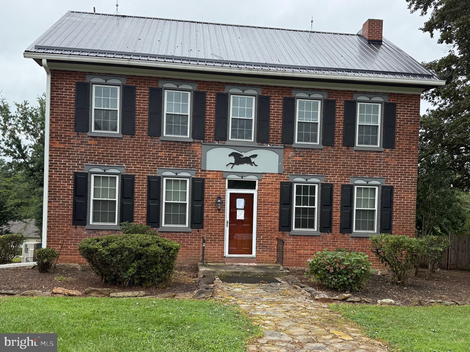 Wonderful Turn of the Century Brick Manor Home with 2160 Square feet in Main House and 768 Square feet in Additional Detached Structure That has Full Kitchen and Bath for Possible Apartment or In Law Quarters! Large Oversized Garage for Workshop or Storage! Beautiful Corner Lot with Mature Landscaping on Large Lot just under One Acre! Home could use some Cosmetic Updates but is Ready for your Personal Touches!