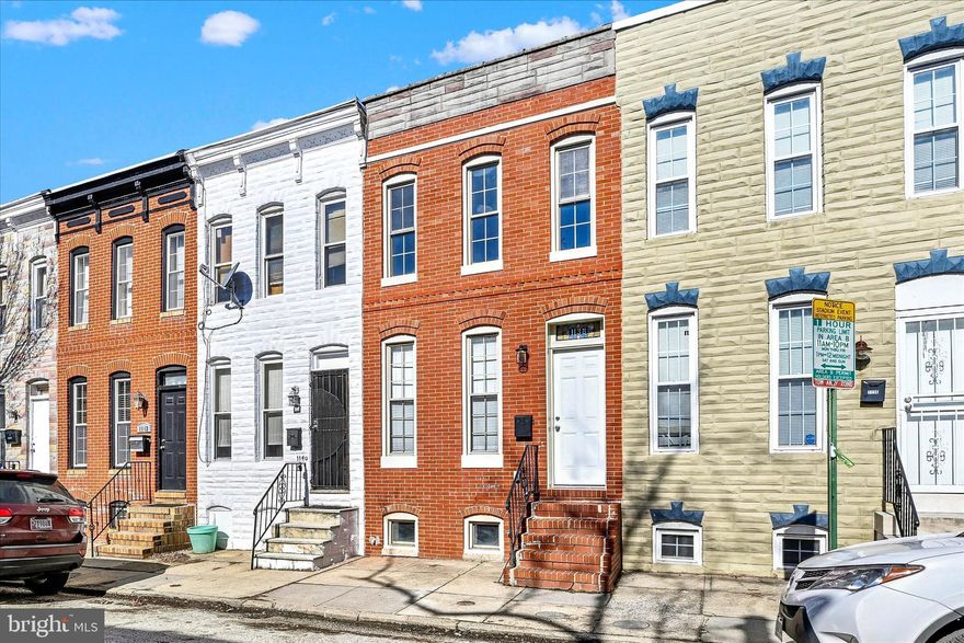 Welcome to 1138 Cleveland St — a move-in ready townhouse in the heart of Pigtown offering 2 bedrooms and 2.5 bathrooms. The main level features beautiful wood flooring and recessed lighting throughout, along with a charming exposed brick wall that adds character to the spacious living room and dining room combo. The updated kitchen is equipped with quartz countertops and stainless steel appliances, and a convenient half bath completes the main level.

Upstairs, you’ll find carpeting throughout and two generously sized bedrooms, including a spacious primary suite with its own private bathroom. An additional full bathroom in the hallway and a laundry area add to the home’s functionality. The basement provides flexible space that can be used as a recreation room, workout area, or additional storage.

Enjoy the convenience of a private parking pad in the rear yard. Ideally located between Camden Yards and M&T Bank Stadium with easy access to I-95, transportation, and the Inner Harbor. Schedule your showing today!