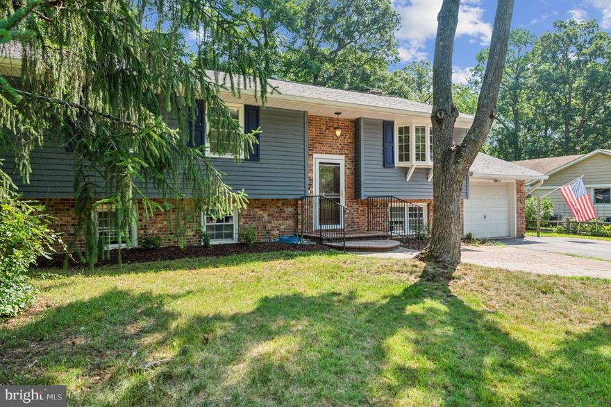 🏡 Charming Split-Level Home in a Serene Water Community! 🏖️

Nestled in a tranquil water community, this stunning split-level home offers the perfect blend of modern updates and cozy charm. Step inside to discover the inviting warmth of gleaming wood floors that grace the main living areas, creating a welcoming atmosphere throughout. The four newly painted and carpeted bedrooms provide a retreat of comfort, while the three renovated bathrooms exude luxury with their modern fixtures and elegant design.

On the lower level, new floors add a fresh touch to this versatile space, featuring a family room for relaxation and entertainment, a workroom for projects or hobbies, and a fireplace for cozy evenings. Step outside to enjoy the beauty of nature with an expansive deck and a screened porch, ideal for unwinding and entertaining guests. The extra-large rear yard beckons for outdoor activities and gatherings, providing ample space for your lifestyle needs.

Boasting a beach boat launch within the community, waterfront living has never been more convenient. Enjoy easy access to the water and a serene beach in this idyllic setting. Located near schools, parks, shopping centers, and dining options, this home offers both tranquility and convenience. Don't miss the opportunity to make this exquisite split-level home yours and experience the charm and comfort it has to offer.

To schedule a viewing and explore this exceptional property further, contact us today at Hill Team Homes,  Discover the allure of waterside living and the joy of calling this split-level sanctuary your own.