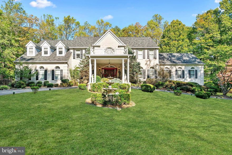 Spectacular custom home with nearly 10,000 finished sq ft on 5 acres in Devereux Station!  Enter through the covered portico and circular drive, into a magnificent two-story foyer with marble flooring, curved staircase, and custom Jeffersonian ceiling dome.  Luxurious touches and decor throughout the home include moldings, columns, exquisite wooden built-ins, two wood-burning fireplaces, skylights, French doors, and marble, tile, and hardwood flooring.  The stunning kitchen is the heart of the home with granite counters, marble floors, center island, six-burner JennAir stovetop, SubZero flush mounted frig, double wall ovens, extensive cabinetry and recessed lighting.  There's room for everyone and everything with expansive spaces for entertaining, working, dining, exercising, and relaxing!  Unique features of this estate home include a side sunroom/billiard room, rear sunlit solarium with castle-like windows and wood-paneled ceiling, and a lower-level party room with dance floor, mirrors, spotlights, and curved walk-behind bar!  The walk-out lower level also offers a full apartment with second kitchen, 6th bedroom, living room, den, and 4th full bathroom.  Enjoy privacy and outdoor living on the main deck, a Juliet balcony off the primary bedroom, and the wide-open rear yard, surrounded by mature trees.  The home has been richly decorated and personalized but offers so much space and potential for new owners to bring their own dreams to life.  The property offers technology features like four HVAC zones, ceiling-mounted speakers, exterior cameras, and security system. 
INVESTORS - current homeowners have lived here 30+ years and would gladly rent from new owners, ask Listing Agent for details.