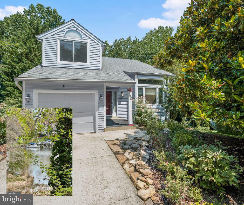 Tucked away on a peaceful cul-de-sac in the desirable Georgetown Grove community, this beautifully maintained three-level waterfront home offers the perfect blend of privacy, comfort, and convenience, with stunning views of Back Creek. Set on the largest lot in the neighborhood, this contemporary home is surrounded by natural beauty, including a protected wetland bird sanctuary that attracts blue herons, hawks, and deer. Gentle breezes from the water, scenic vistas, and an abundance of wildlife create a serene, park-like atmosphere that is truly one of a kind. The home is set on a picturesque wooded lot and welcomes you with hardwood floors, a thoughtful layout, and abundant natural light. Step into the open-concept living and dining areas, where a dramatic two-story vaulted ceiling and a wall of feature windows perfectly frame lush landscaping. The kitchen is both functional and charming, featuring white cabinetry, granite countertops, pantry storage, and a sunlit table area overlooking the trees and creek. Just beyond, the family room offers a cozy retreat with a fireplace and a triple-panel sliding glass door that leads to the tiered entertainment deck, ideal for outdoor gatherings and peaceful relaxation. A stylish powder room, laundry room, and garage access complete the main level.
Upstairs, the primary suite includes two closets, a separate vanity area, and a spacious en suite bath with double vanity, soaking tub, and separate shower. Two additional bedrooms, one with a cathedral ceiling, share an updated full bath. The finished walkout lower level provides versatile space for recreation, complete with a cedar closet, full bath with steam shower, and access to a stone patio that’s surrounded by trees . Outdoor living is effortless with a multi-level deck, landscaped yard, and peaceful water views in multiple seasons. The nearby private marina makes boating and waterfront access simple and convenient. Additional recent updates include a newer roof and many replaced windows, ensuring long-term peace of mind. Located just one mile from Quiet Waters Park and minutes from Eastport, downtown Annapolis, the Naval Academy, marinas, restaurants, and commuter routes to Washington DC and Baltimore, this home combines natural serenity with unbeatable access to the best of the region. A rare opportunity to enjoy waterfront living in a truly special setting.