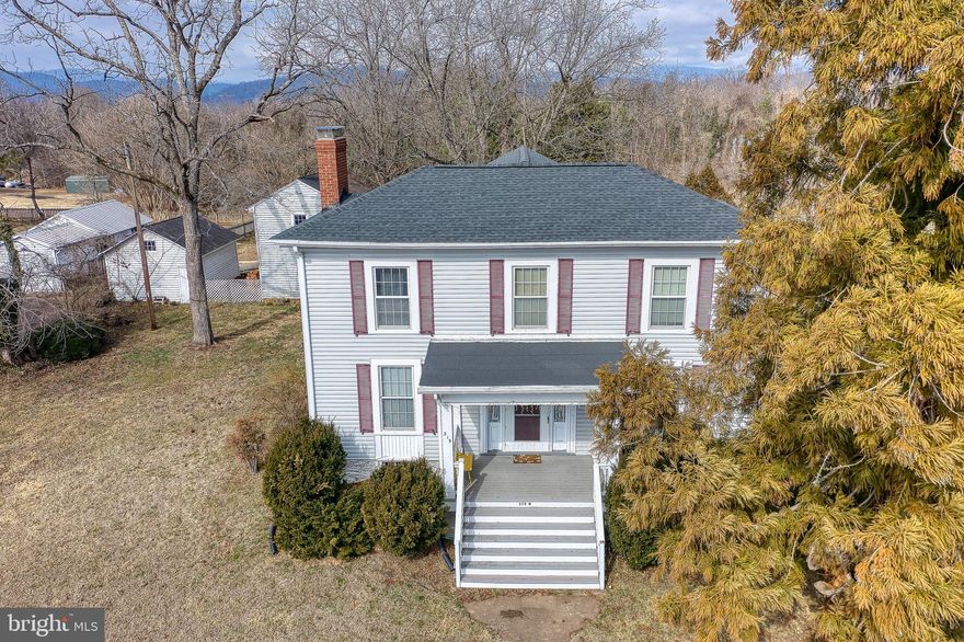 Circa 1840 | A Timeless Madison Treasure

Step back in time and own a remarkable piece of Madison’s history. Constructed around 1840 by John Richard Gooding and proudly featured in The Historic Homes of Madison, this well-maintained Colonial residence pre-dates the Civil War and is rich with architectural character and enduring charm.

From the moment you arrive, the classic columned front porch and double front doors with a transom window set the tone for what awaits inside. Beautiful Heart Pine and Oak floors run throughout the home, complemented by crown molding, original woodwork, and six fireplaces (currently sealed) that reflect the craftsmanship of a bygone era.

Inside, you’ll find a grand foyer, a cozy family room with wood stove, and a formal living room. The large country kitchen offers abundant cabinetry and gathering space, while the sunroom provides a bright and peaceful retreat.

Front and rear winding staircases lead to three spacious bedrooms and a full bathroom, preserving the historic layout while offering comfortable living.

Outdoor living is just as special — a large deck connects to the original first Madison Schoolhouse, creating a truly unique extension of the property. Additional exterior features include a detached 1-car garage, woodshed, storage shed, oversized .80-acre lot, and a new roof for added peace of mind.

Ideally situated in the heart of Madison, conveniently located between Charlottesville and Culpeper, you can even watch the town parade from your own porch. Walking distance to grab a bite to eat.

 This is more than a home — it’s a legacy. Own a piece of history and make it part of your story