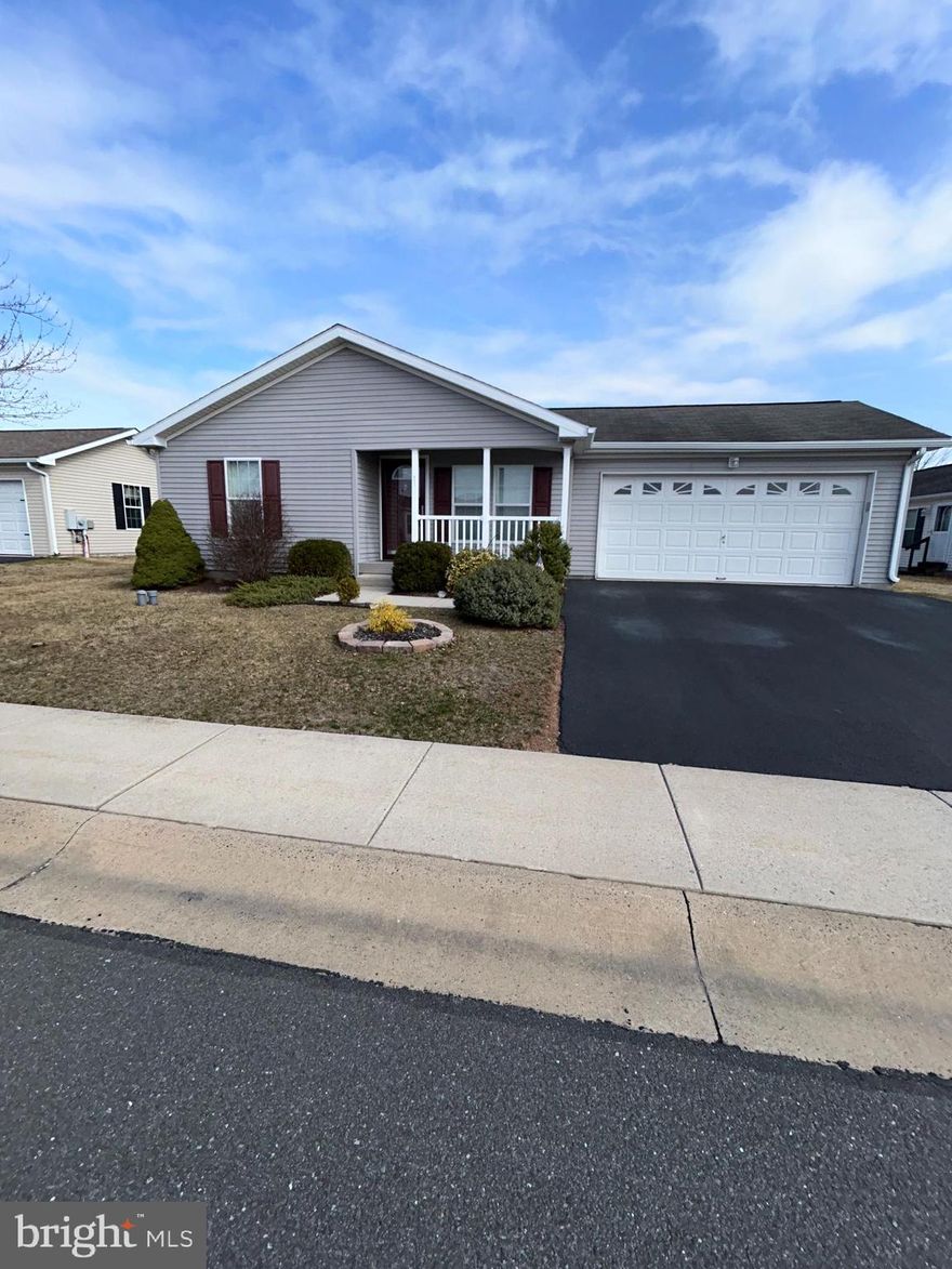 Active Adult 55+ Community,!!HOME WARRANTY!! INCLUDED !! Location, Location steps away from Club house , pool and activities.,   Our popular Holly IV Model featuring Double Master Suites, Each suite has its own large closets with Bathroom attached, Walk in shower with bench seat, other has tub shower combo, both have full linen closets. Front Porch leads into Living Room that is open to the 25' Kitchen, approx 9' island, with open pass thru to Living Room.  Kitchen has an exit to Deck featuring private rear setting, also entrance to garage from kitchen.  Kitchen also has Dishwasher, Garbage disposal built in Microwave, Pantry, stainless steel sink and overhead lighting.  Laundry room with window and laundry tub.  2 entrances to Family Room from kitchen with honey comp window treatments, Stone gas fireplace with mantle, raised hearth with switch for blower and spot lights.  The community includes a Club House with game rooms, gathering room, gym, Kitchen and exterior Heated Pool.  Also included is grass cutting, snow removal and trash.  Take a tour to care free living, easy to show.