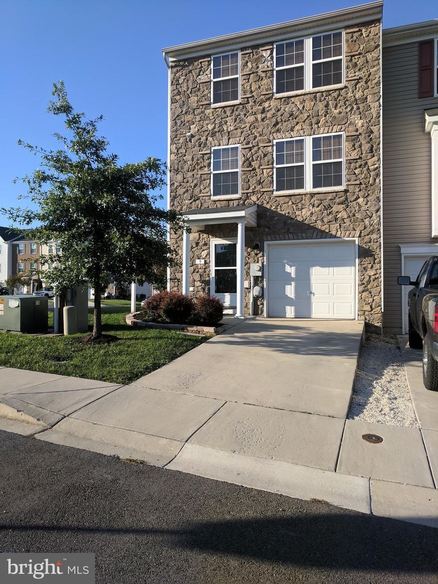 PRICE IMPROVEMENT. This is an immaculate end unit townhome located conveniently to Route 81 in Falling Waters. Large corner lot with plenty of yard space for cook outs and planting your garden. Basement bonus/mud room. Bamboo wood floors, ceramic tile and wall to wall carpet make this floor plan flow like a dream.  Schedule your showing now to be in by the holidays.