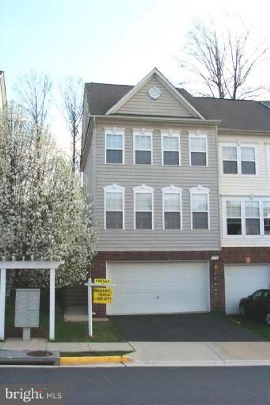 Please call first B4 you showing!!! Beautiful End unit Town house backing to trees with 2 car garage. Spacious kitchen features and granite counter-top, hardwood floor on main level with gas fire place. Large living room. Convenience location, close to I-66, Rt.29, 50, wegman & fairfax corner. Please remove your shoes !!!