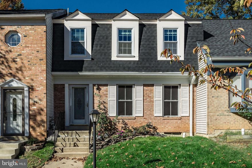 Move in ready in perfect location!!! Beautiful Townhouse located 1 mile from Vienna/Fairfax metro station (15 minute walk).  Recently painted, carpets professionally cleaned, hardwood  floors buffed. Master bedroom has walk in closet with built-in furniture.  Master bathroom has a three person jacuzzi, separate frameless glass shower. Attic with pull down stairs for extra storage. Additional shared full bathroom and 2 spacious bedrooms. Main level has huge kitchen with lots of cabinets and large pantry. Breakfast island, pendant lights. Breakfast nook with access to fenced stone patio. Living/Dinning room combination with hardwood floors and crown molding through  out. Fully finished basement with wonderful bar with sink, great for entertaining, full bathroom. Huge laundry room with new washer and dryer. Second refrigerator for your convenience. Two assigned parking spaces in front of property (no permit required) and street parking for guests.