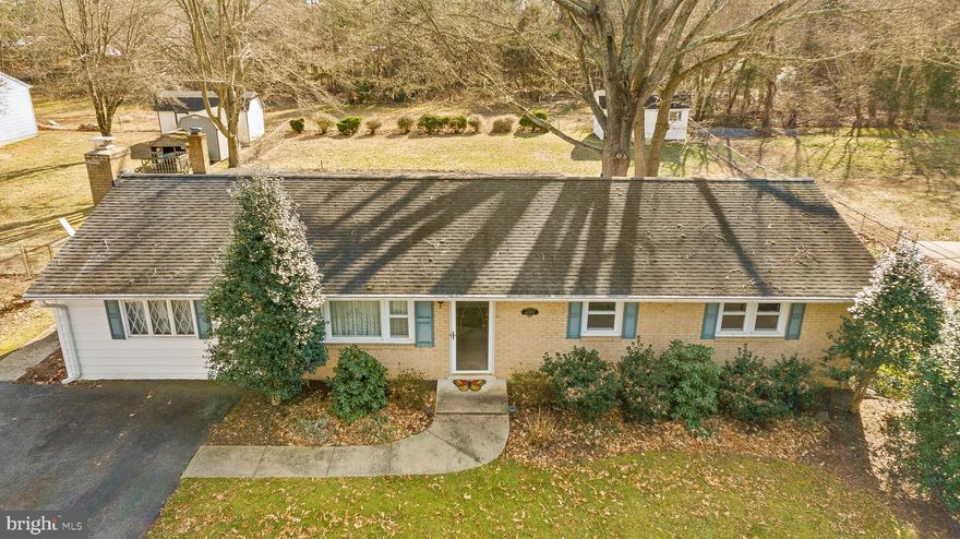 Spacious one level Rambler on almost a 1/2 acre fenced lot.  Jameson Road offers a small community with no HOA'S with beautiful curb appeal.  This home features three bedrooms, 1.5 baths with a separate Living Room, large separate Family Room, Dining Room and enclosed oversize Patio.  Family Room offers a fireplace.  This home has original hardwood floors underneath the carpet.  The large level fenced lot has great potential.  large double door shed will provide lawn storage.  Over 1600 sf of living space. Just minutes from shopping and close by routes to DC & VA.