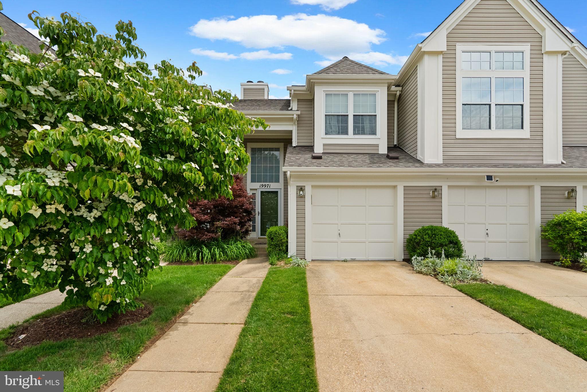 This beautifully maintained 2-bedroom, 2.5-bath townhouse is the perfect place to call home!
Enjoy a sun-filled living room with newer flooring, recessed lighting, and a cozy wood-burning fireplace. The private patio backs to a peaceful tree line—ideal for relaxing or entertaining. The dining area flows seamlessly into the updated kitchen, featuring vaulted ceilings, stainless steel appliances, granite countertops, and a charming breakfast nook.
The main level also includes garage access, an updated powder room, and a brand-new washer and dryer for your convenience.
Upstairs, the spacious primary suite offers high ceilings, a pristine en-suite bathroom, and a generous walk-in closet. The second bedroom provides a comfortable space, complemented by a full bathroom. Soft carpeting throughout the upper level enhances the home’s warmth and comfort.
Located just one mile from a shopping center and I-270, this home offers both convenience and commuter-friendly access. Don’t miss this opportunity!