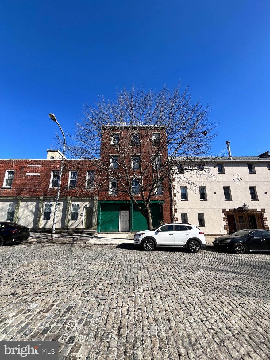 Welcome to 319 N Front St. This historic, post-conflagration building has not been offered for sale for almost half a century and awaits your vision for redevelopment. With access from both Front St and Water St, the new owner can build a palatial single-family home or two luxury units. The current owners envisioned two luxury units, each with a Water St garage parking space, and with a 5-6 stop elevator from garage to roof deck. Preliminary plans have already received conditional approval by the Historic C0mmission, and simply awaits building plans and permits. Schedule a tour today!