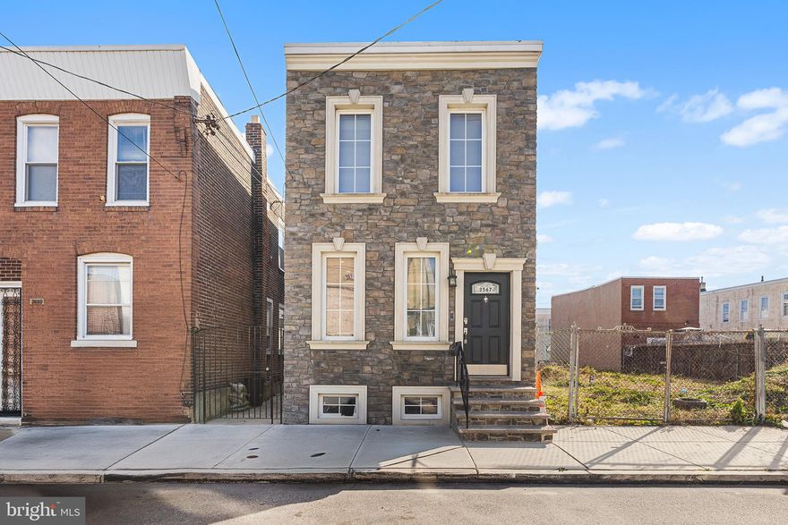 Welcome to 3567 Witte St, a newly renovated 3 bedroom, 2.5 bath home ready for its next owner. Located on a quiet block in the booming Port Richmond neighborhood, this beautifully designed property blends classic curb appeal with modern comfort. 

The stone front creates a striking first impression, and inside you’ll find an open, airy living room centered around a floor to ceiling stone electric fireplace and rich hardwood floors. The kitchen is a true highlight, featuring 42 inch dark custom cabinetry with under cabinet lighting, a sleek glass tile backsplash, granite countertops, and stainless steel energy efficient appliances. From here, step out to the rear yard, an ideal spot for relaxing or entertaining. A well placed powder room completes the main level.

The second floor includes three spacious bedrooms, including a primary suite with generous closet space and a large private ensuite bath with a relaxing jetted tub. This level also provides a second full bathroom and a laundry area with a stackable washer and dryer for added convenience.

Additional highlights include energy efficient European tilt windows, central air, a Nest thermostat, and newer plumbing and electrical systems throughout. The large, clean basement provides excellent storage and plenty of flexibility. With thoughtful upgrades and a refined design, this home is truly move in ready! It sits just minutes from I-95 and is conveniently close to shopping options such as Walmart, Target, and a variety of local restaurants and stores. A great opportunity to own a turnkey property!
