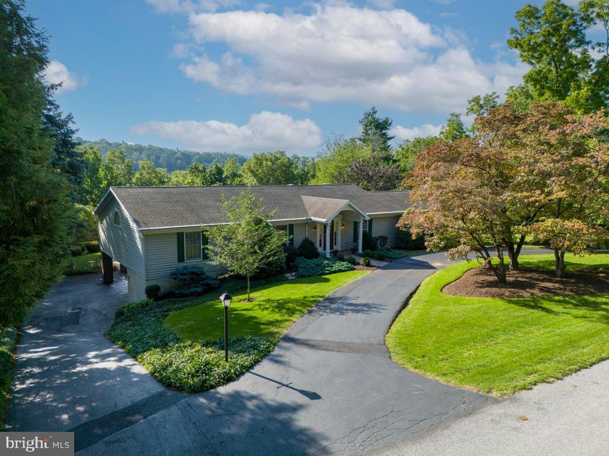 Price Reduction with Sellers Assistance up to $10,000.  

Nestled in the quiet neighborhood of Forest Ridge, this hilltop property has been lovingly improved and meticulously cared for over the past 50 years.  Built in 1973, the home has undergone various additions and is an entertainer's dream!  The raised ranch offers a nice blend of traditional floorplan features with some fresh surprises. 

Upon entering, you will find a traditional Living Room overlooking a circular driveway, perfect for receiving guests.  The Dining Room is ideal for everyday and those special holiday memories with family & friends.  Continue on to the Kitchen and you will feel the warmth of the rich, custom cherry cabinets with a lovely corner window overlooking the landscaping, feeling very zen.  With incredible storage and large Corian countertops, the Kitchen will be a place to gather.  There's a quaint breakfast bar overlooking the brick wood burning fireplace in the Family Room that makes a seamless transition. The Family Room is cozy yet light and bright with windows on three sides and a private veranda overlooking the pool and private backyard. The Primary Suite is very generously sized with a private spa-like en suite bathroom and two walk in closets.  Two additional bedrooms, full bath and storage round out the main level.  

The lower level would be a perfect suite (in-laws, guests, family of any age) or on its own!  Living spaces would be ideal for office, bedroom, craft room or more.  There's a flexible space which could be used for a canning kitchen, crafts or converted to a kitchenette / dining space with a private full bath. The Sun Room also offers windows on three sides and 2 accesses to the yard, pool and lower patio.  A large Laundry Room with ample storage pairs well with the additional storage in the 3 bay garage.  Current use is parking in two of the bays.  The third bay is ideal for storage of your yard tools, pool equipment or could be used as a workshop. 

The in-ground cocktail pool is 3.5' deep throughout making it the perfect plunge or safer set up for families with young children.  The homesite is 0.9 acre with mature plantings and trees making this property a true private oasis.  

PRIVATE | QUIET | SERENE
3,156+ square feet | 3 Bedrooms | 3 Baths | 3 Bay Garage | 0.91 acres