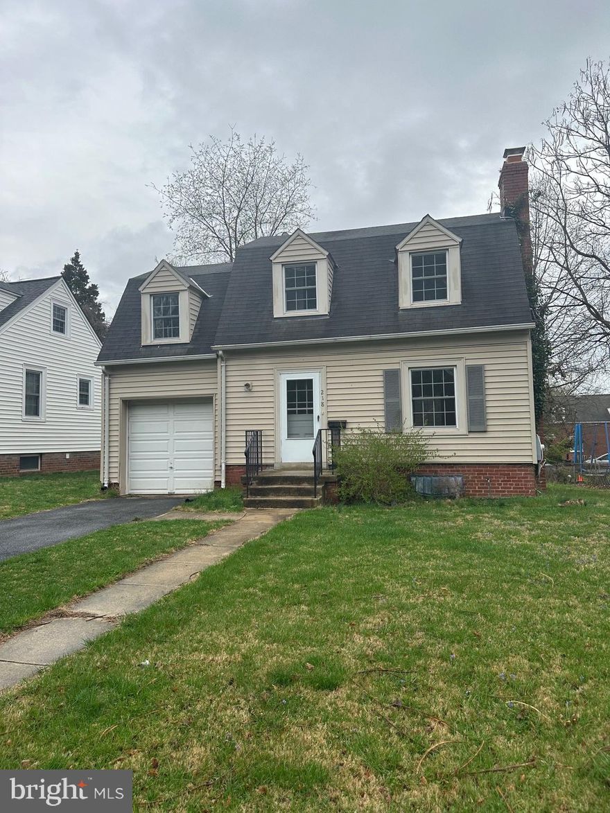 Adorable house conveniently located in downtown Rockville.  This 3 BR, 1 FBA home is within walking distance to Rockville Metro, Rockville Town Center, Rockville Library, Richard Montgomery High School, District and Circuit Courthouses, and much more!  Hardwood floors throughout, wood burning fireplace in living room, separate dining room, large rear yard, unfinished basement, one car attached garage and driveway/off street parking!  Tons of character and potential with this one.  Sold "As-Is".