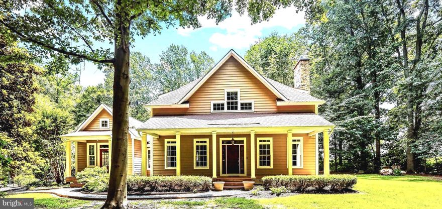 This property is located on a dead-end road, ensuring a peaceful and private environment. Please refrain from driving past the 2nd driveway entrance to the garages, as there is no turnaround available beyond the home. However, the driveway offers ample space for easy maneuvering, making it convenient for visitors. This spacious home is designed to accommodate everyone comfortably, featuring ample living areas that promote relaxation and togetherness. Set on over an acre of land, it provides a remarkable level of privacy, making it an ideal retreat from the hustle and bustle of daily life. Enjoy the perfect blend of space and seclusion in this inviting property, perfect for families and gatherings. Experience luxury living in this stunning home featuring, vaulted ceilings, recessed lights, ceiling fans, a fireplace and a first-floor primary bedroom that exceeds expectations. Enjoy the convenience of spacious walk-in closets, a private full bathroom with a walk-in shower, and a serene porch for relaxation. The oversized eat-in kitchen is a culinary dream, equipped with Soap Stone countertops, a 4 x 6 wood block countertop with an additional sink, a 4-burner gas stove, a Gaggenau side grill, and heated floors on the main level of thehome, perfect for entertaining. The formal dining and living areas lead you to the stairway up to the two additional bedrooms with a Jack and Jill bathroom. The first-floor sunroom, complete with a wet bar, mini fridge, and pantry cabinetry, offers an ideal space for gatherings. There are decks and patio areas off the kitchen and sunroom. The first-floor laundry makes that chore a breeze. Above the 3-car garage, a versatile living area awaits, ready to be transformed into an extra primary bedroom, game room, or office, complete with its own deck and full bathroom containing a walk-in shower. The home also has a generac generator, large vehicle parking pad and a 2-car/boat/RV carport. This home truly has it all for modern living and entertaining.