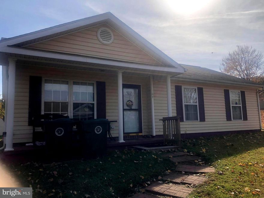 Great Starter home for the first time home buyer or for the couple wanting to downsize. Rancher has a walkway to covered front porch. Home has vaulted ceilings in the open living room to country kitchen with back door exit to rear yard. Hallway leads to the 3 bedrooms and 2 bathrooms, both bathrooms have tile floors and new commodes, owner having the paint freshened, heat pumps have a warranty with 3 years left, water heater has been replaced, washer is 1 year old, home needs a little TLC with new owner's personal touch. Close to hospital, local shopping and restaurants.