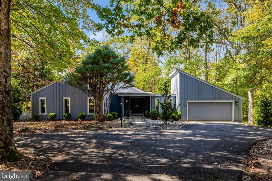 Stylish Contemporary Home on 2 Acres of Scenic Privacy
Thoughtfully designed, this modern home is perfectly positioned on a picturesque 2-acre lot, offering both privacy and style. The open-concept layout showcases meticulous attention to detail, with sleek finishes and high-end design throughout.
Enjoy the ease of main-level living with 3 spacious bedrooms and 2.5 baths, all within a bright and airy floor plan. The gourmet kitchen features a dramatic waterfall quartz island, soaring ceilings, and expansive windows that flood the space with natural light and offer stunning views of the surrounding landscape.
The fully finished walkout lower level adds even more living space with a large recreation room, two additional bedrooms, and a full bath—ideal for guests, home office, or multi-generational living.
Step outside to a brand-new, multi-level deck perfect for entertaining or relaxing, overlooking a large, level backyard that offers privacy and plenty of room to play or garden.
A rare combination of modern design, functional living, and serene outdoor space—this home truly has it all.