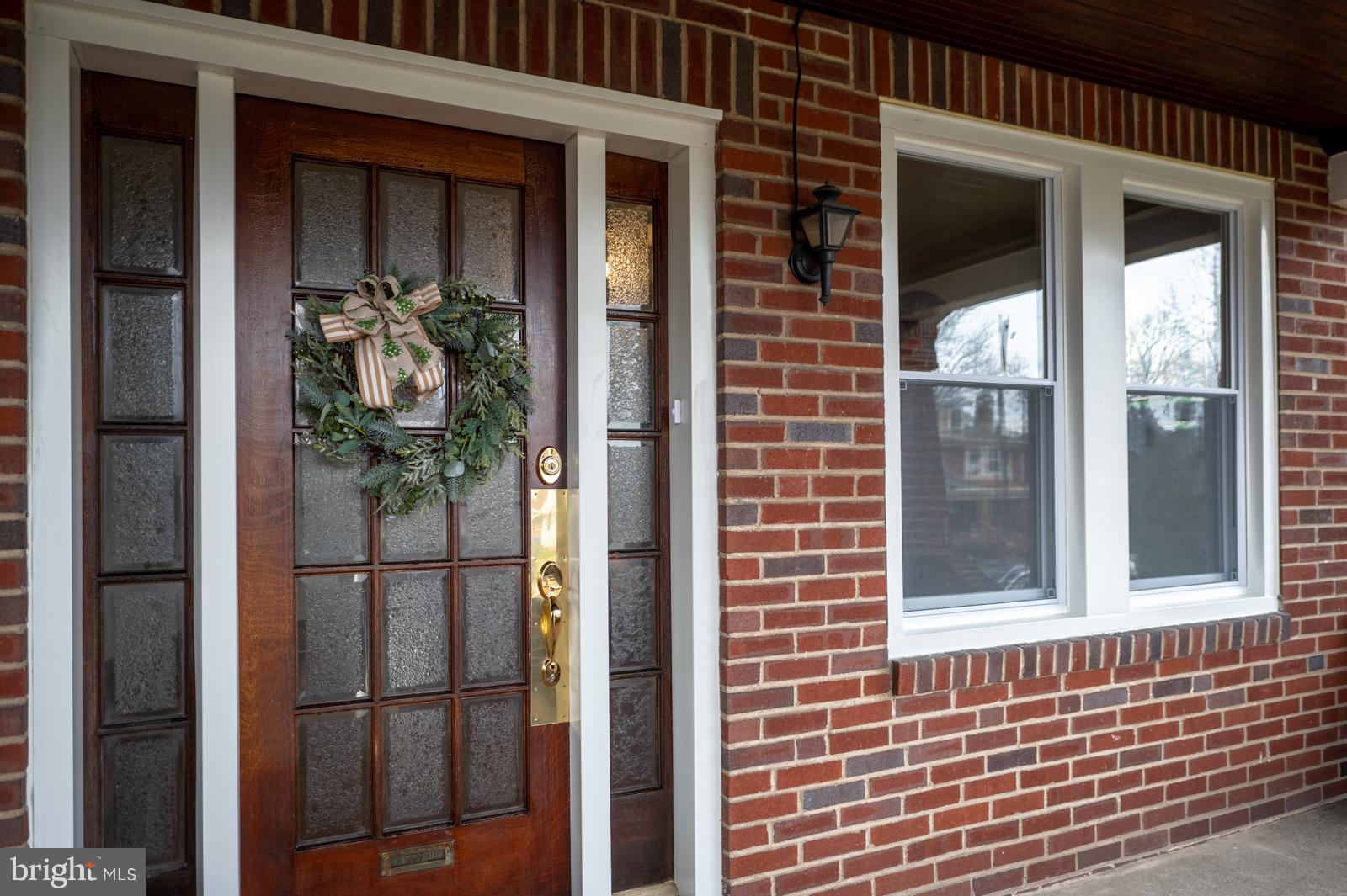 A lovely North End twin. This 1920's brick home has gone through some beautiful renovations including replacement windows throughout. Enter through the front door at the covered masonry porch and be welcomed into the living room. Here you will find a brick fireplace, stained glass windows and stunning refinished hardwood floors which are standouts throughout this home. The large dining room features numerous windows allowing for lots of natural light and ample space for daily dinners and holiday gatherings. Through the butler door is a refreshed kitchen with white cabinets, stainless steel appliances and a tile floor with radiant heat. Wrapping up the first floor is a full bathroom also known as a wet room, featuring a rain shower and blue tooth light/exhaust fan system, giving you a modern and musical shower experience. Another focal point of the home is a beautiful stairwell and banister as well as original woodwork throughout. Follow the stairs to the top, you will find 3 nice sized bedrooms with fresh paint and refinished hardwood floors. The second floor would not be complete without its full bathroom including tub with a tiled shower surround, beautiful denim blue tiled floors, a free-standing vanity and a small open closet with recessed shelves. On the third floor, you will find the large bedroom with refinished hardwood floors and a beautiful radius window. This property offers a one car garage and off-street parking for one vehicle. While this home has numerous modern changes there is still tons of original charm. This 100+ year old home has enough of a blank slate for you to easily add all your own personal touches.