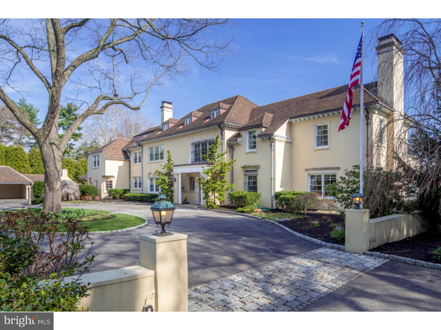 This stately estate home, in pristine condition, on 1.45 impeccably-landscaped acres sits beyond impressive iron gates and a beautiful entry courtyard, awaiting your family's comfort. The massive 15,081 SF interior awes you, offering 8 BRs, 8 baths, 2 powder rooms, expansive intricately-detailed spaces for living/entertaining, and a huge finished lower level. An elevator transports you from floor to floor; a walled motor court, 3-car garage and 2-car carport provides ample parking; and a resort-like heated swimming pool and spa assures hours of pleasure for guests and loved ones. Old world classicism and architectural distinction define this exceptional home that is a dream for large families, and those who love to entertain. An elegant 2-story reception hall with a regal staircase, multiple coat closets and random-width pegged hardwood floors (found throughout the main level) welcomes you in. Formal living and dining rooms w/ magnificent moldings and fireplaces, a gourmet center island dream kitchen w/ granite counters, furniture-style cherry cabinetry, premium-grade appliances and a breakfast area, fabulous family room with a fireplace and wall of windows, and richly-paneled library with gorgeous built-ins and a fireplace afford generous accommodations for elaborate parties. While family amuse themselves in the lower level game and recreation rooms, current owners open up the whole house to guests - or enjoy private time in smaller spaces. Access oasis-like terraces from the family room, sitting room off the foyer, and sunroom off the living room with a barreled ceiling, built-in wet bar and Palladian windows on 3 exposures. On the 2nd floor is a luxurious master suite brightened by triple exposures, w/ a dressing room, French doors to a walk-in closet, and a spa bath w/ heated marble floors, soaking tub and frameless glass shower. 4 other spacious BRs are also en-suite w/ stylish baths; plus there are laundry and workout rooms. Work peacefully in the home office w/ built-in bookcases, cabinetry, desk and a private bath on the 3rd floor w/ 2nd laundry, large BR with bath, workstation and bonus room. What fun the entire family will have in the lower level with a full wet bar, sitting area, game room w/a mural wall and ping pong/pool tables, rec room w/ a fireplace, and a wine cellar. A separate apartment above the garage w/ a living rm, kitchen and bedroom is perfect for visitors or staff, and an auxiliary generator powers the entire house when needed