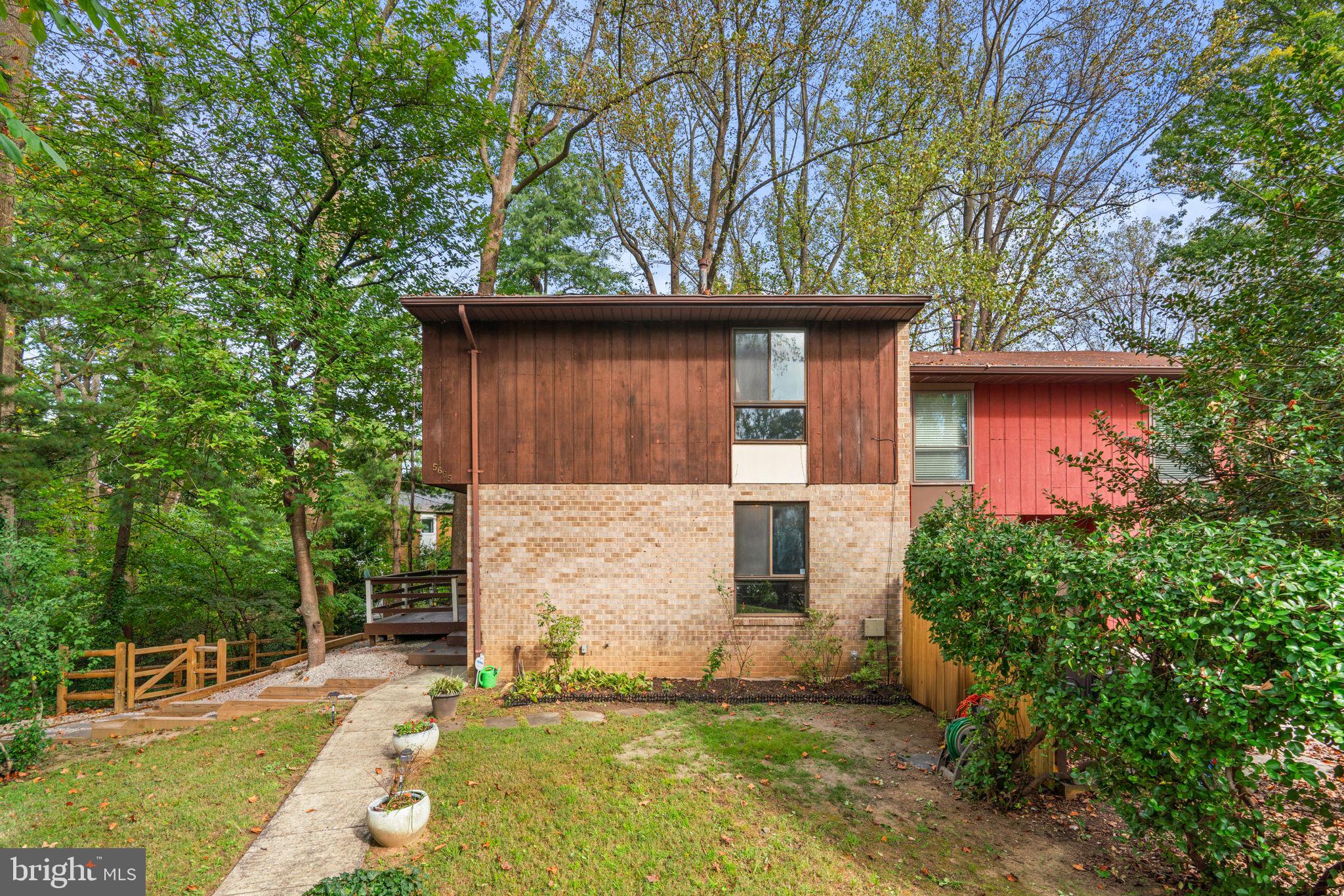 Fantastic 3-bedroom, 2.5-bathroom end-of-unit townhome is now available in the sought-after Columbia. This Village of Wild Lake beauty aims to please with ample upgrades. The home welcomes you with a cozy living room complete with a wood-burning fireplace. From there, you'll find the updated kitchen with gorgeous cabinets and ample counter space. A separate dining room and a powder room complete the level. The upper level features a spacious primary suite with a large walk-in closet and an en-suite bathroom. Two additional large bedrooms and a second full bath complete the level. The finished basement provides ample space for relaxation as well as storage. Enjoy the serenity of the outdoors on the rear deck or patio overlooking the fenced yard. The wooded lots provides unexpected privacy for a townhome. Easy access to shopping, dining, and commuter routes.