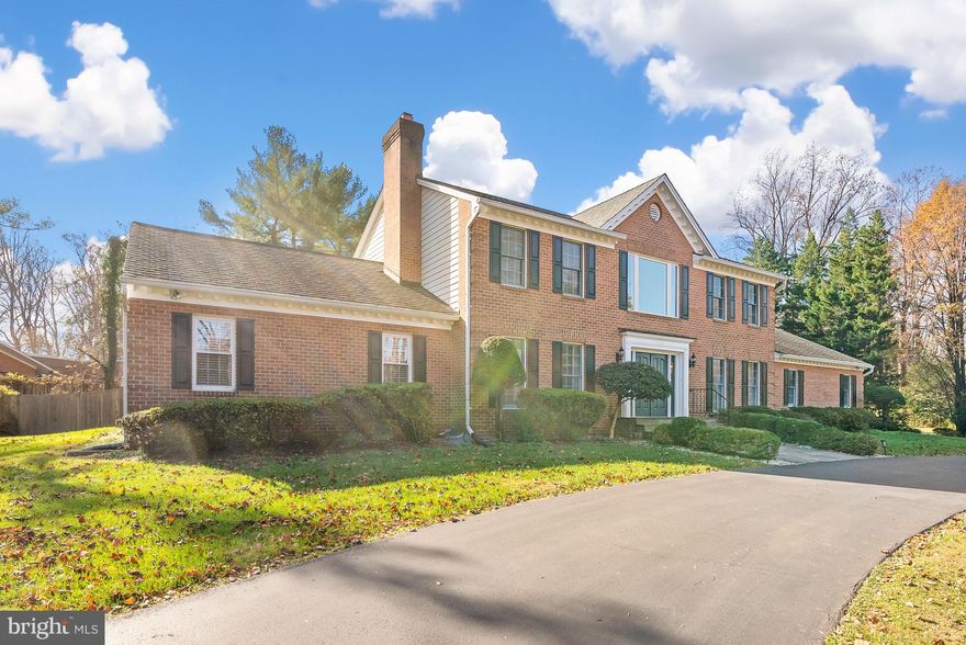 5 bedrooms, 4 & a half baths and three car garages - Gorgeous and beautiful home privately sitting in an desired location in Bethesda! Recently updated: refinished kitchen cabinets, new kitchen wood floor, new refrigerator, new washer & dryer, new  vanity  cabinets, sinks, toilets quartz vanity tops in bathrooms, new mirrors, new glass shower booth. Installed new media room, new wetbar with wine cooler and new refrigerator, new electric fireplace in lower level. Two spacious master suites on main and upper level with contemporary master baths , Jacuzzis and his and her walking closets . New window blinds, new lightings, freshly painted, new carpet in media room. Library with built-in shelves and a just step into foyer, dazzling chandeliers over-head and fabulous tile floor, gleaming wood floors to living room with new electric fireplace, guest room and a beautifully decorated dining room with dazzling chandelier. Finished huge walk up basement leading to wooded backyard, and garages, beautifully landscaped lot with fenced on the rear and generous parking spaces with circular driveway.  Easy access to 495, 270, Seven Locks and River Rd for commuting and far enough away from the hustle and bustle, but still close and accessible to everything.