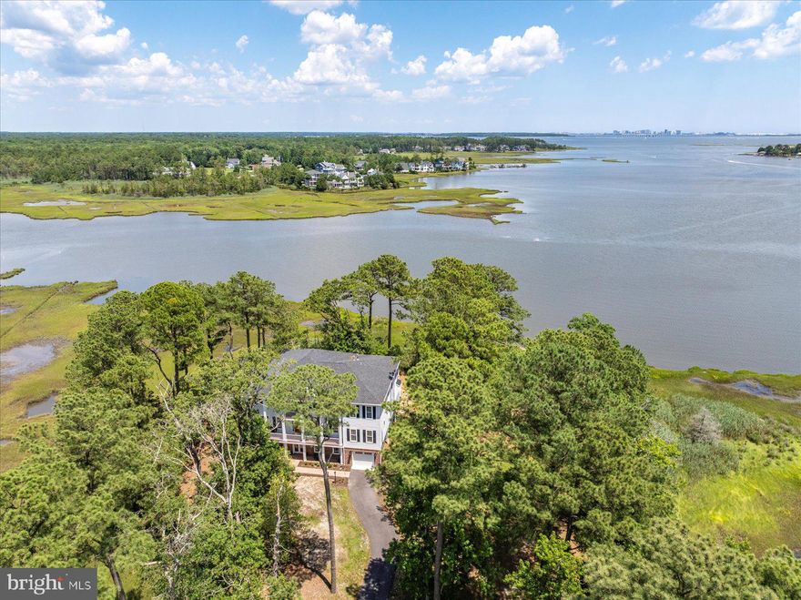 Stunning Custom-Built 3-Story Home with Panoramic Water Views.

Discover coastal luxury in this one-of-a-kind, custom-built residence offering 6 spacious bedrooms, 4.5 elegantly appointed bathrooms, and breathtaking views of the Ocean City skyline. Spanning three levels, this architectural gem boasts a gourmet kitchen, five fireplaces, a dedicated home office, several cozy dens, and multiple living spaces designed for comfort and entertaining.

Every detail reflects craftsmanship and thoughtful design, from the grand open floor plan to the private balconies that invite you to enjoy serene waterfront sun rises & sunsets. Perfectly blending elegance and functionality, this home is ideal for those seeking a unique blend of privacy, space, and scenic beauty.