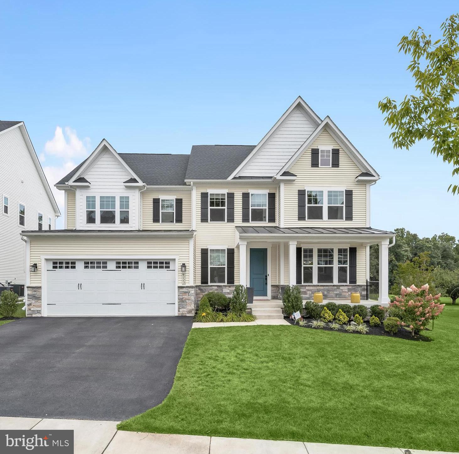 Absolutely IMMACULATE! Welcome to this exceptional transitional-style home in sought-after Maple Lawn South, offering 4 spacious bedrooms, 4.5 baths, and over 5,000 square feet of beautifully finished living space. Built in 2022, this property blends modern design with timeless detail, creating an inviting atmosphere with an up-to-the-minute vibe perfect for both everyday living and entertaining.
Step inside to an open floor plan with LVP flooring, robust with natural light, and thoughtfully designed spaces. The bright white kitchen is a true showstopper, featuring quartz countertops, stainless steel appliances, ceramic backsplash, 42” cabinetry with under-cabinet lighting, an oversized entertainer’s island with breakfast bar, and a walk-in pantry. A breakfast room provides direct access to the screened porch and the adjacent study. The open plan design unfolds seamlessly into the family room offering a cozy gas fireplace with mounted media, while the formal dining room and private study with extended length and French doors offer versatile options for work or gatherings. A spacious mudroom and arrival center with bench, built-in cubbies and a half bath complete the main level.
Beautiful hardwood stairs and carpet runner escort you to the upper level in style where the oversized upper hall has a matching area rug. The serene primary suite showcases French doors, a tray ceiling, and sparkling spa-inspired en suite bath. The primary suite and all the secondary bedrooms feature up-down blackout blinds for comfort and privacy. Light streams in through the window in a generously sized laundry room offering front loading washer and dryer and a utility sink, conveniently situated adjacent to the upper hall and bedrooms.
Downstairs, newly installed carpet in 2025 make the recreation space like-new with walk-up access to the rear lawn. The fully finished rec room and game area are complimented with a full bath and additional unfinished spaces that offer room to grow with areas to relax, play, or entertain.
Outdoor living is truly impressive beginning with a welcoming covered porch in front, and a side yard that is extended and enhanced by the adjacent easement. Resort styled amenities in the rear include a screened porch with a vaulted ceiling, concealed LED rafter lighting and technology that offers a power lift for screen panels. One button and the screens remotely rise and the screen porch becomes a covered patio that cascades gently down to the patio and fire pit. Family and friends can gather, meander and enjoy outdoor living at its finest.
As part of the vibrant Maple Lawn South community, residents enjoy access to an in-ground pool, clubhouse with kitchen, recreation and media area, paved walking trails, tot lot, and a convenient location within walking distance to schools. Nearby shopping, dining, and entertainment in Maple Lawn provides a plethora of options for shopping, dining and entertainment. This like-new home is a perfect blend of luxury, comfort, and community living—move-in ready and waiting for its next owner.