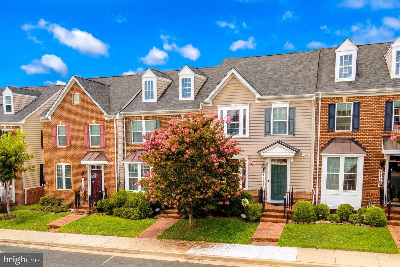 Welcome to Clarksburg Village! This beautiful townhouse is perfectly situated in the heart of the community, nestled in a quiet neighborhood. Step inside to an open floor plan with gleaming hardwood floors and fresh paint throughout. There’s ample space for both formal and casual living, and the open kitchen is a true centerpiece—featuring a large center island with seating for four or more, stainless steel appliances, gas cooking, and a range hood for the ultimate culinary experience.
From the kitchen, step through the rear patio door to a private Trex-deck courtyard—perfect for BBQs and gatherings—which leads directly to your own two-car garage.
Upstairs, the spacious primary suite offers a large walk-in closet and a well-appointed bath with upgraded tile and a soaking tub. Two additional bedrooms, a full hall bath, and a convenient laundry room complete the upper level.
The finished lower level includes a home office or guest bedroom, a full bath with walk-in shower, and generous storage space.
Enjoy all the sought-after amenities of Clarksburg Village, including two community pools, playgrounds, common areas, sidewalks, nature trails, and the scenic Greenway Trail. Ideally located near I-270, 355, and 27, with easy access to the MARC station and top shopping/dining destinations such as Clarksburg Outlets, Wegmans, Target, Paris Baguette, Panera, Crumbl, and more—all within five minutes.
More Photos Coming Soon.